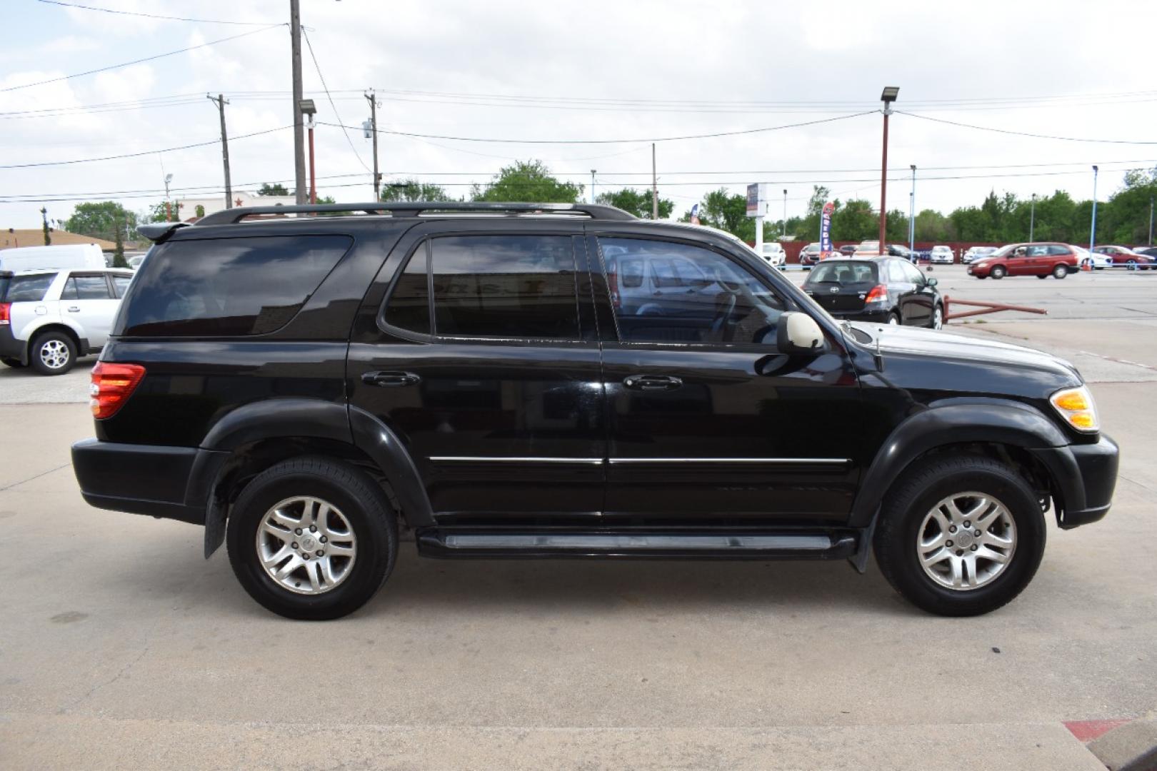 2004 Black /Black Toyota Sequoia Limited 2WD (5TDZT38A14S) with an 4.7L V8 DOHC 32V engine, 4-Speed Automatic Overdrive transmission, located at 5925 E. BELKNAP ST., HALTOM CITY, TX, 76117, (817) 834-4222, 32.803799, -97.259003 - Photo#3