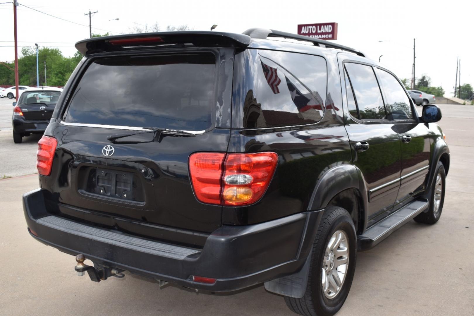 2004 Black /Black Toyota Sequoia Limited 2WD (5TDZT38A14S) with an 4.7L V8 DOHC 32V engine, 4-Speed Automatic Overdrive transmission, located at 5925 E. BELKNAP ST., HALTOM CITY, TX, 76117, (817) 834-4222, 32.803799, -97.259003 - Photo#4