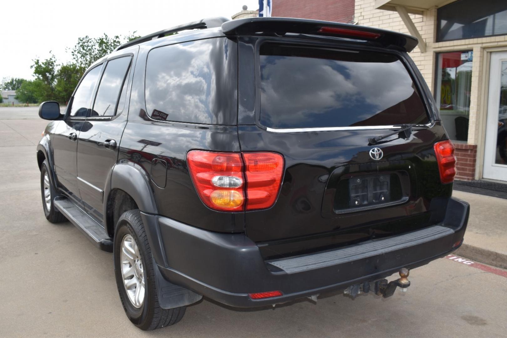 2004 Black /Black Toyota Sequoia Limited 2WD (5TDZT38A14S) with an 4.7L V8 DOHC 32V engine, 4-Speed Automatic Overdrive transmission, located at 5925 E. BELKNAP ST., HALTOM CITY, TX, 76117, (817) 834-4222, 32.803799, -97.259003 - Photo#5