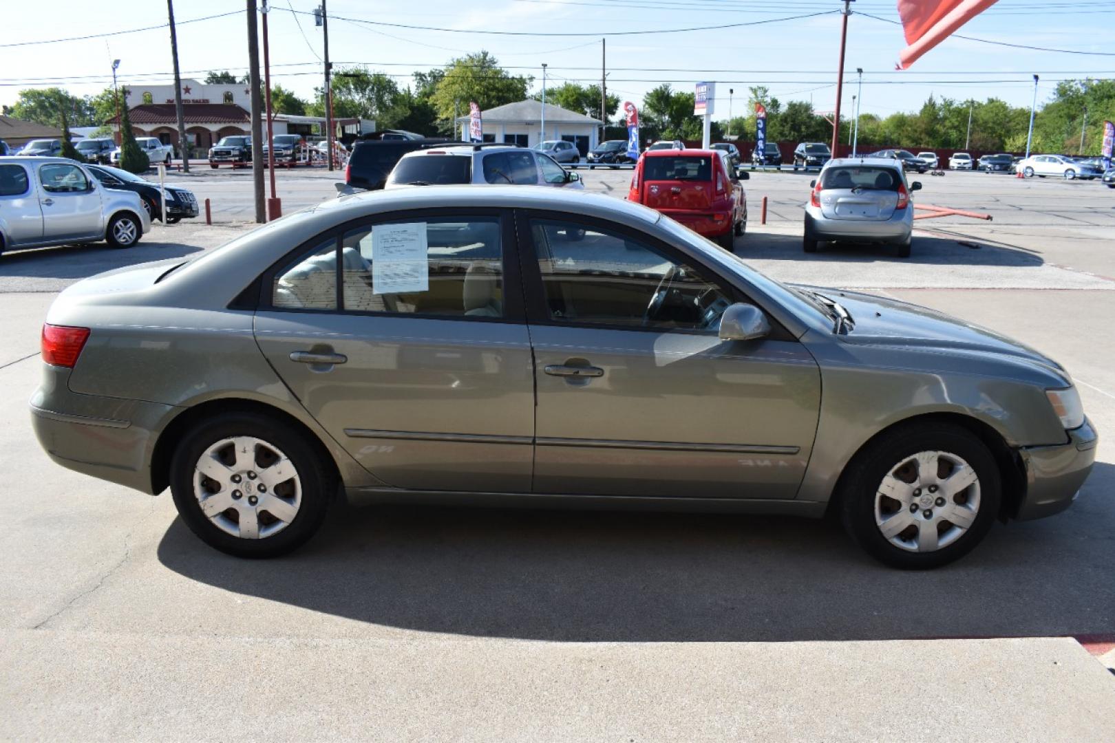2009 Green /Tan Hyundai Sonata GLS (5NPET46C29H) with an 2.4L L4 DOHC 16V engine, Automatic 5 Spped transmission, located at 5925 E. BELKNAP ST., HALTOM CITY, TX, 76117, (817) 834-4222, 32.803799, -97.259003 - There are several compelling reasons to consider buying a 2009 Hyundai Sonata GLS: Affordability: The 2009 Hyundai Sonata GLS is often available at an affordable price point, making it an attractive option for budget-conscious buyers. Fuel Efficiency: The Sonata is known for its excellent fuel eff - Photo#3