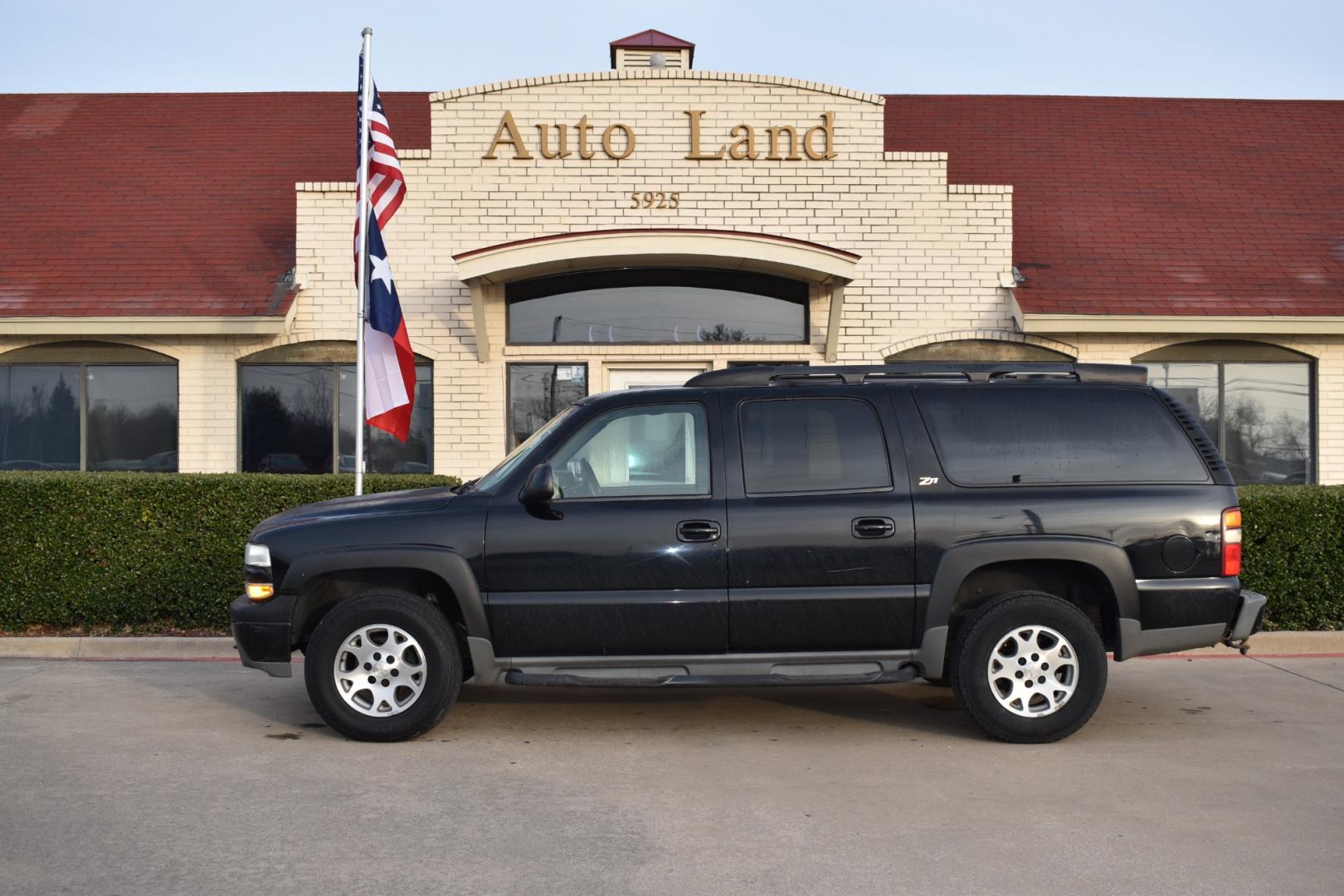 2003 Black /Beige Chevrolet Suburban 1500 4WD (3GNFK16Z13G) with an 5.3L V8 OHV 16V FFV engine, 4-Speed Automatic Overdrive transmission, located at 5925 E. BELKNAP ST., HALTOM CITY, TX, 76117, (817) 834-4222, 32.803799, -97.259003 - [Scene: A picturesque suburban neighborhood on a sunny day. The camera pans through lush lawns and beautiful homes.] Narrator (V.O.): Welcome to the heart of the suburbs, where life is all about family, adventure, and making memories that last a lifetime. [Cut to a driveway, where a well-maintaine - Photo#0
