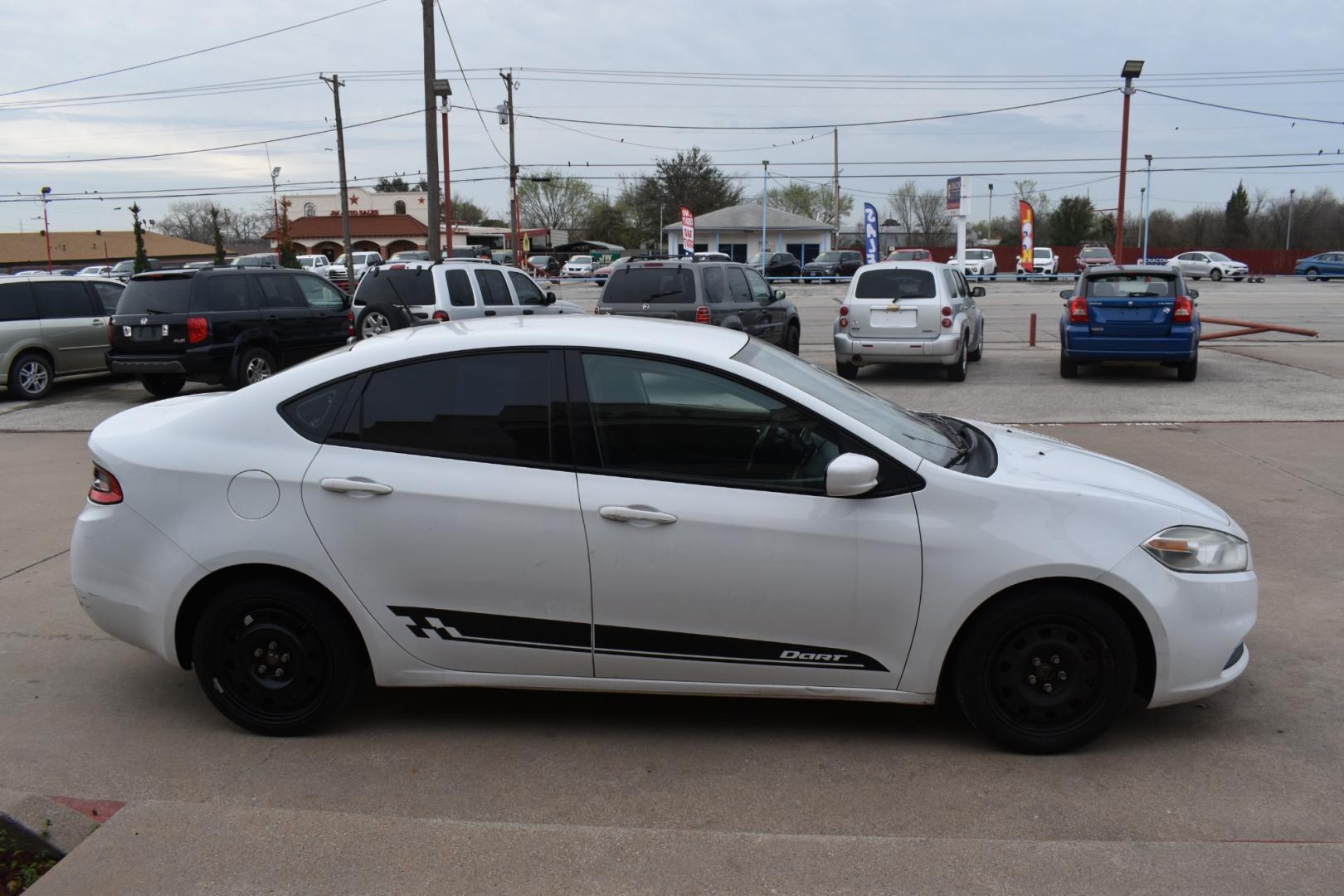 2016 White /Black Dodge Dart SE (1C3CDFAA0GD) with an 2.0L L4 DOHC 16V TURBO engine, 6 SPEED AUTOMATIC transmission, located at 5925 E. BELKNAP ST., HALTOM CITY, TX, 76117, (817) 834-4222, 32.803799, -97.259003 - The decision to buy a 2016 Dodge Dart SE should be based on your specific needs and preferences, but here are some reasons why you might consider this vehicle: Affordability: The 2016 Dodge Dart SE is often available at a competitive price point, making it an attractive option for budget-conscious - Photo#3