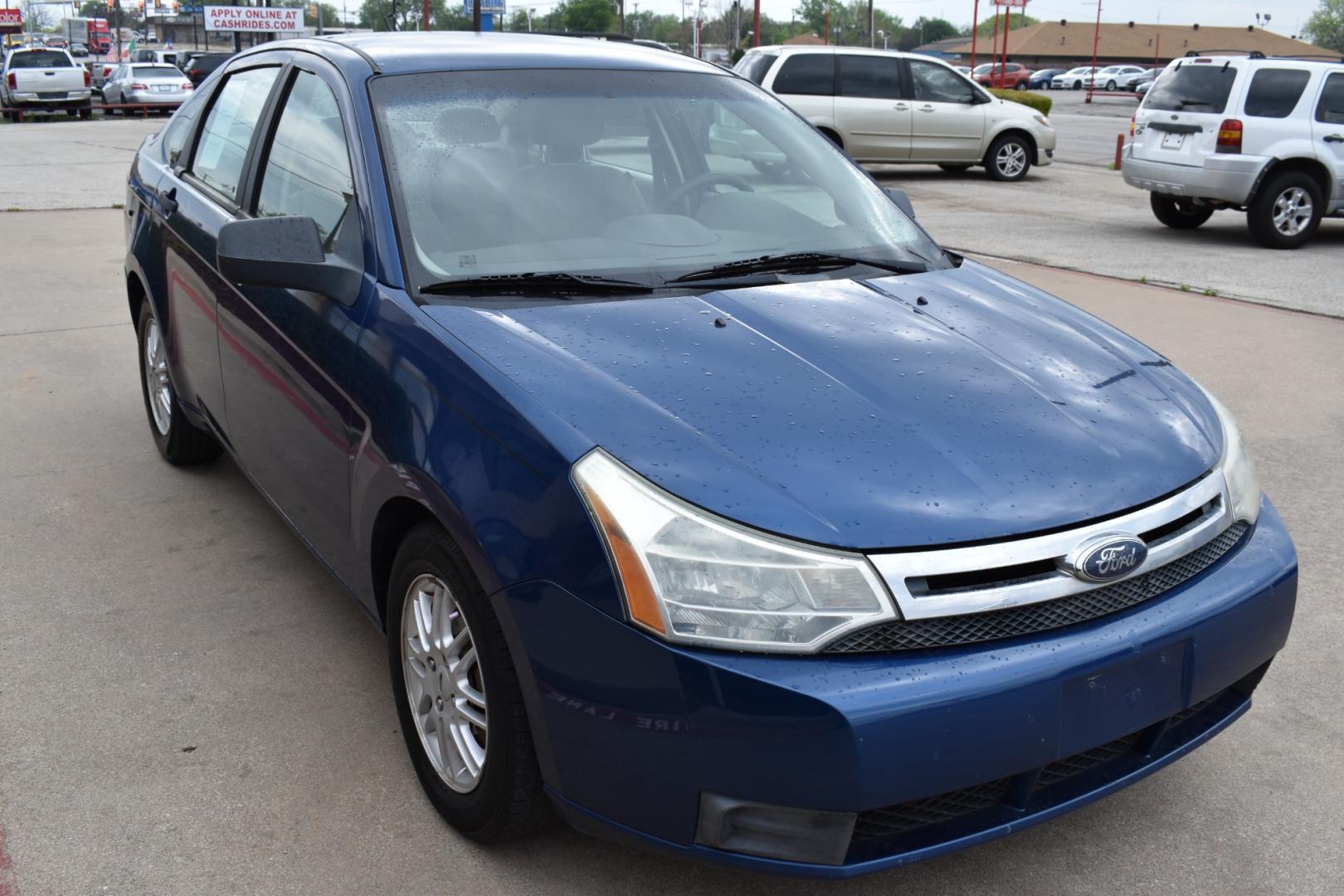 2009 Blue /Gray Ford Focus SE Sedan (1FAHP35N19W) with an 2.0L L4 DOHC 16V engine, AUTOMATIC transmission, located at 5925 E. BELKNAP ST., HALTOM CITY, TX, 76117, (817) 834-4222, 32.803799, -97.259003 - Purchasing a 2009 Ford Focus SE Sedan can be a sensible choice for several reasons: Affordability: The 2009 Ford Focus SE Sedan is often available at an affordable price point, making it an attractive option for budget-conscious buyers. Fuel Efficiency: The Focus is known for its good fuel efficie - Photo#2