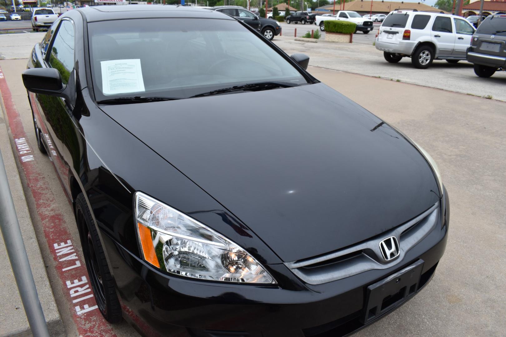2006 Black /Black Honda Accord EX V-6 Coupe AT w/ XM Radio (1HGCM82626A) with an 3.0L V6 SOHC 24V engine, 5-Speed Automatic Overdrive transmission, located at 5925 E. BELKNAP ST., HALTOM CITY, TX, 76117, (817) 834-4222, 32.803799, -97.259003 - Purchasing a 2006 Honda Accord EX V-6 Coupe AT with XM Radio offers several compelling reasons: Reliability: Honda is renowned for building reliable vehicles, and the 2006 Accord is no exception. It's known for its longevity and low maintenance costs, providing peace of mind for years to come. Pow - Photo#2