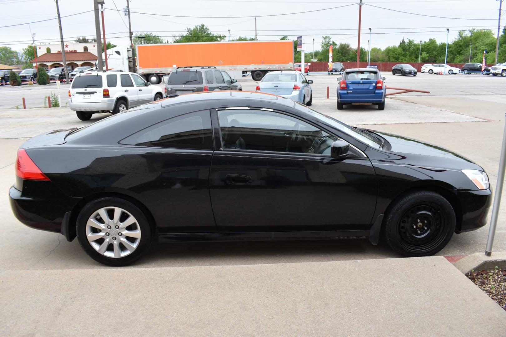 2006 Black /Black Honda Accord EX V-6 Coupe AT w/ XM Radio (1HGCM82626A) with an 3.0L V6 SOHC 24V engine, 5-Speed Automatic Overdrive transmission, located at 5925 E. BELKNAP ST., HALTOM CITY, TX, 76117, (817) 834-4222, 32.803799, -97.259003 - Purchasing a 2006 Honda Accord EX V-6 Coupe AT with XM Radio offers several compelling reasons: Reliability: Honda is renowned for building reliable vehicles, and the 2006 Accord is no exception. It's known for its longevity and low maintenance costs, providing peace of mind for years to come. Pow - Photo#3
