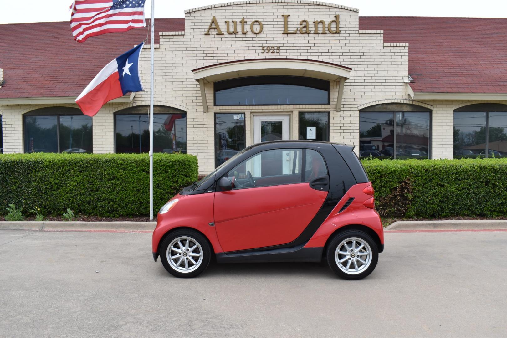 2009 Red /Red smart Fortwo Passion (WMEEJ31X69K) with an 1.0L L3 DOHC 12V engine, 5-Speed Manual transmission, located at 5925 E. BELKNAP ST., HALTOM CITY, TX, 76117, (817) 834-4222, 32.803799, -97.259003 - Photo#0