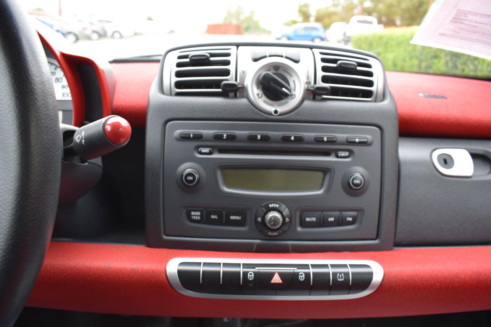 2009 Red /Red smart Fortwo Passion (WMEEJ31X69K) with an 1.0L L3 DOHC 12V engine, 5-Speed Manual transmission, located at 5925 E. BELKNAP ST., HALTOM CITY, TX, 76117, (817) 834-4222, 32.803799, -97.259003 - Photo#9