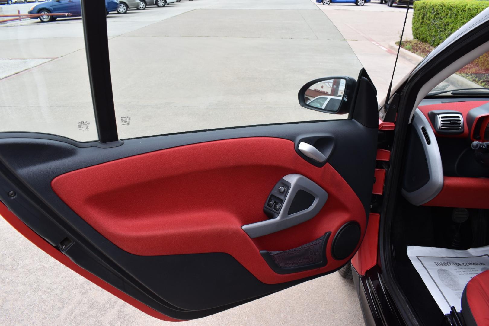 2009 Red /Red smart Fortwo Passion (WMEEJ31X69K) with an 1.0L L3 DOHC 12V engine, 5-Speed Manual transmission, located at 5925 E. BELKNAP ST., HALTOM CITY, TX, 76117, (817) 834-4222, 32.803799, -97.259003 - Photo#6