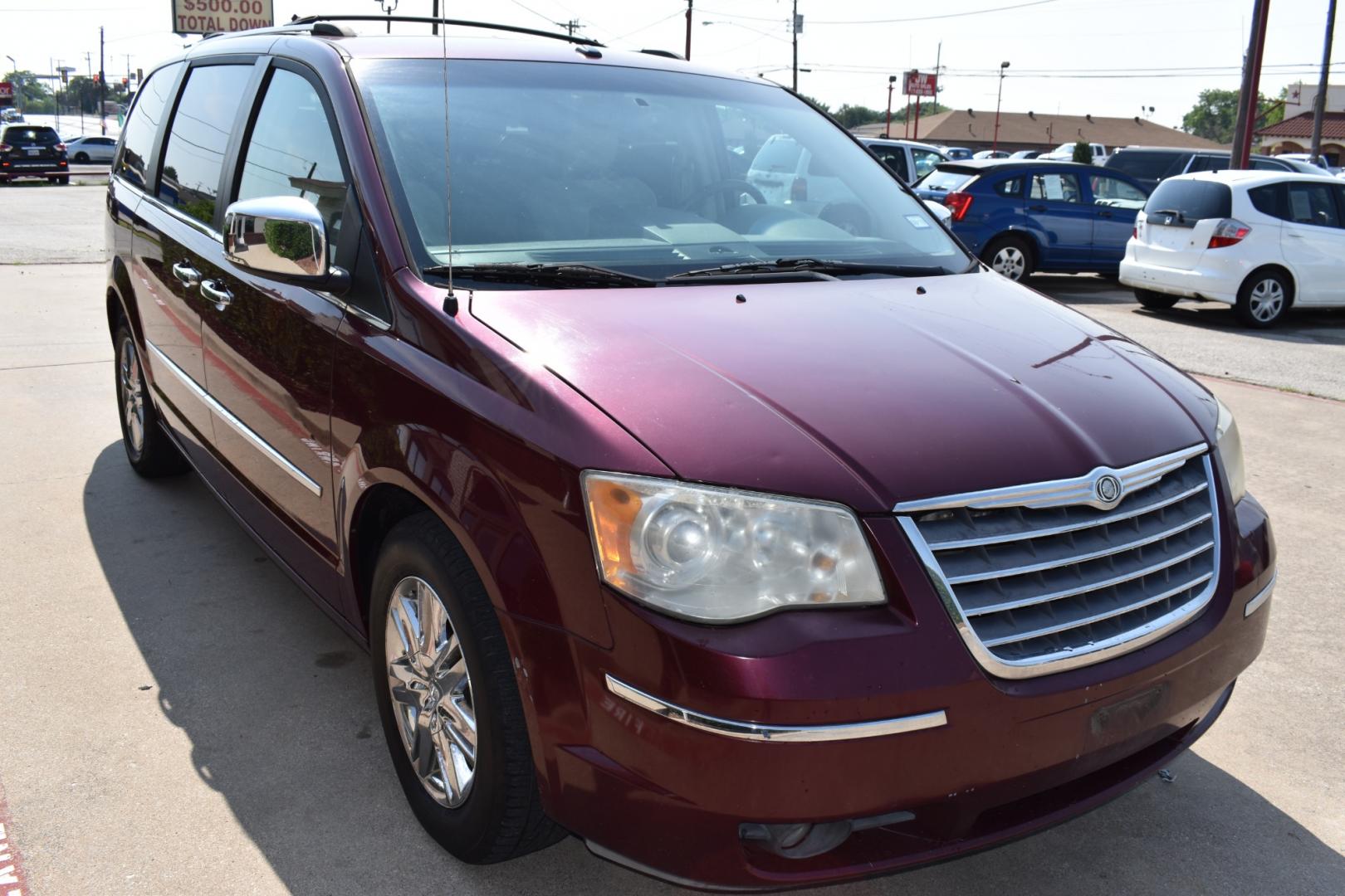 2008 Red /Beige Chrysler Town & Country Limited (2A8HR64X38R) with an 4.0L V6 SOHC 24V engine, 6-Speed Automatic Overdrive transmission, located at 5925 E. BELKNAP ST., HALTOM CITY, TX, 76117, (817) 834-4222, 32.803799, -97.259003 - Purchasing a 2008 Chrysler Town & Country Limited can be a great choice for several reasons: Luxury and Comfort: The Town & Country Limited is the top trim level for this minivan, offering a luxurious and comfortable interior. It often includes features like leather upholstery, power-adjustable sea - Photo#2