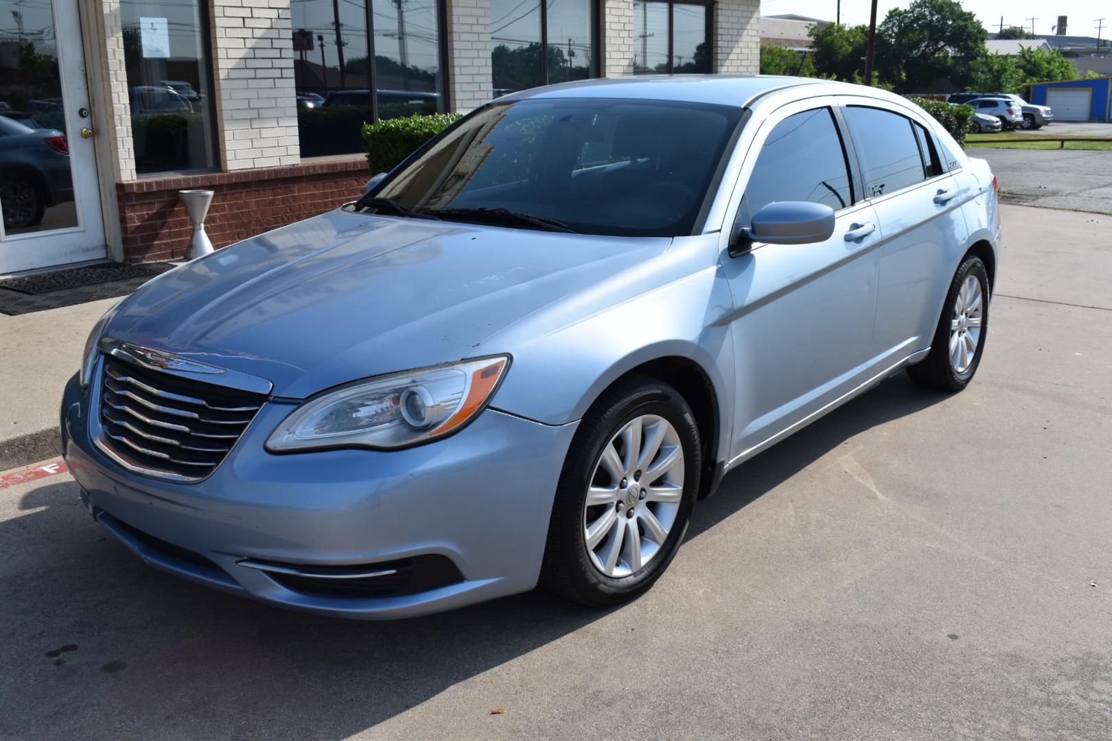 2013 Blue /Black Chrysler 200 Touring (1C3CCBBB5DN) with an 2.4L L4 DOHC 16V engine, 6-Speed Automatic transmission, located at 5925 E. BELKNAP ST., HALTOM CITY, TX, 76117, (817) 834-4222, 32.803799, -97.259003 - CASH ONLY $2,995 Plus TT&L Coupon does not apply. Purchasing a 2013 Chrysler 200 Touring can be a practical choice for several reasons: Affordability: The 2013 Chrysler 200 Touring is often available at a competitive price point in the used car market, making it an attractive option for budget-c - Photo#1