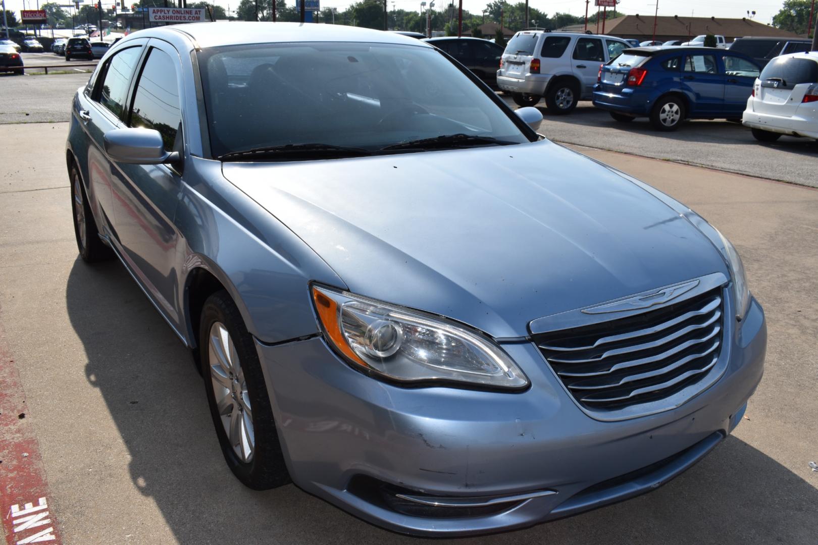 2013 Blue /Black Chrysler 200 Touring (1C3CCBBB5DN) with an 2.4L L4 DOHC 16V engine, 6-Speed Automatic transmission, located at 5925 E. BELKNAP ST., HALTOM CITY, TX, 76117, (817) 834-4222, 32.803799, -97.259003 - CASH ONLY $2,995 Plus TT&L Coupon does not apply. Purchasing a 2013 Chrysler 200 Touring can be a practical choice for several reasons: Affordability: The 2013 Chrysler 200 Touring is often available at a competitive price point in the used car market, making it an attractive option for budget-c - Photo#2