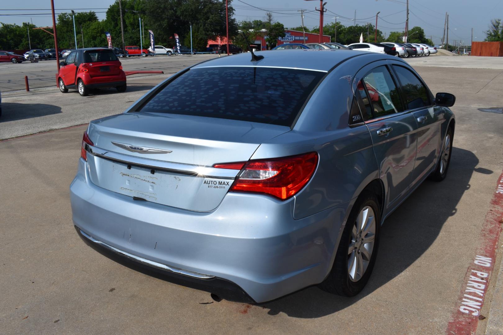2013 Blue /Black Chrysler 200 Touring (1C3CCBBB5DN) with an 2.4L L4 DOHC 16V engine, 6-Speed Automatic transmission, located at 5925 E. BELKNAP ST., HALTOM CITY, TX, 76117, (817) 834-4222, 32.803799, -97.259003 - CASH ONLY $2,995 Plus TT&L Coupon does not apply. Purchasing a 2013 Chrysler 200 Touring can be a practical choice for several reasons: Affordability: The 2013 Chrysler 200 Touring is often available at a competitive price point in the used car market, making it an attractive option for budget-c - Photo#4