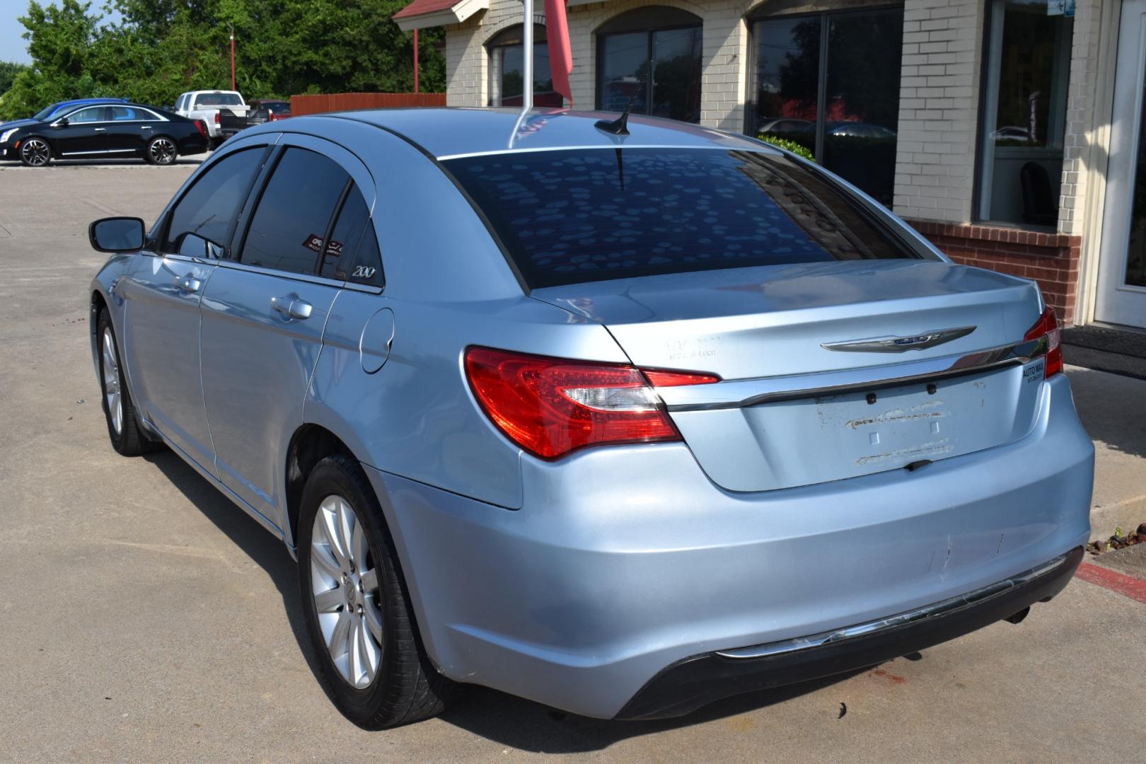2013 Blue /Black Chrysler 200 Touring (1C3CCBBB5DN) with an 2.4L L4 DOHC 16V engine, 6-Speed Automatic transmission, located at 5925 E. BELKNAP ST., HALTOM CITY, TX, 76117, (817) 834-4222, 32.803799, -97.259003 - CASH ONLY $2,995 Plus TT&L Coupon does not apply. Purchasing a 2013 Chrysler 200 Touring can be a practical choice for several reasons: Affordability: The 2013 Chrysler 200 Touring is often available at a competitive price point in the used car market, making it an attractive option for budget-c - Photo#5