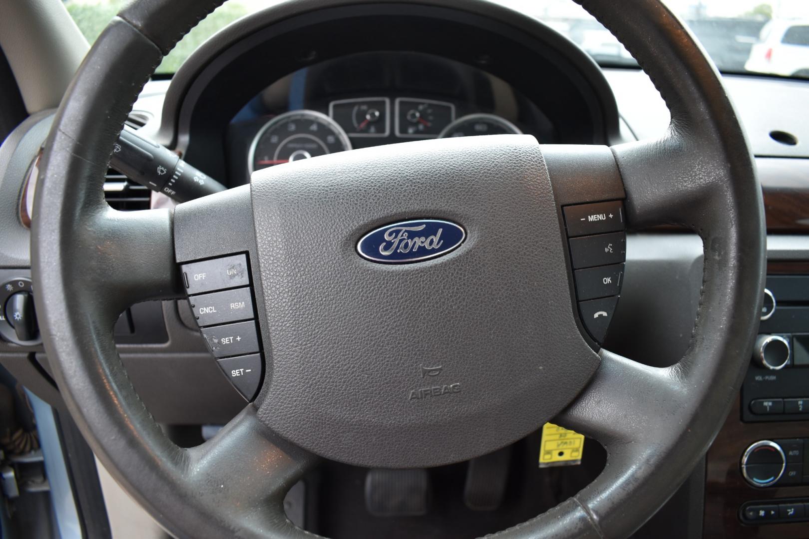 2008 Blue /Gray Ford Taurus SEL (1FAHP24W18G) with an 3.5L V6 DOHC 24V engine, 6-Speed Automatic Overdrive transmission, located at 5925 E. BELKNAP ST., HALTOM CITY, TX, 76117, (817) 834-4222, 32.803799, -97.259003 - Photo#10