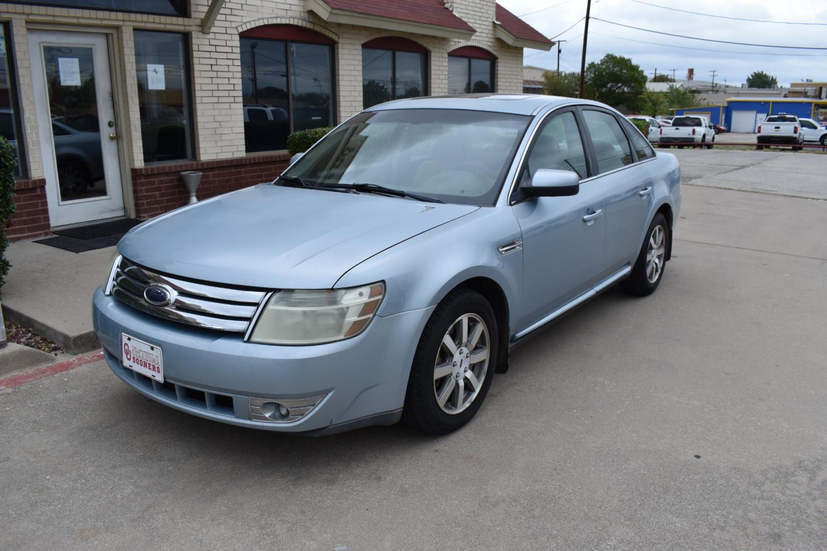 2008 Blue /Gray Ford Taurus SEL (1FAHP24W18G) with an 3.5L V6 DOHC 24V engine, 6-Speed Automatic Overdrive transmission, located at 5925 E. BELKNAP ST., HALTOM CITY, TX, 76117, (817) 834-4222, 32.803799, -97.259003 - Photo#1