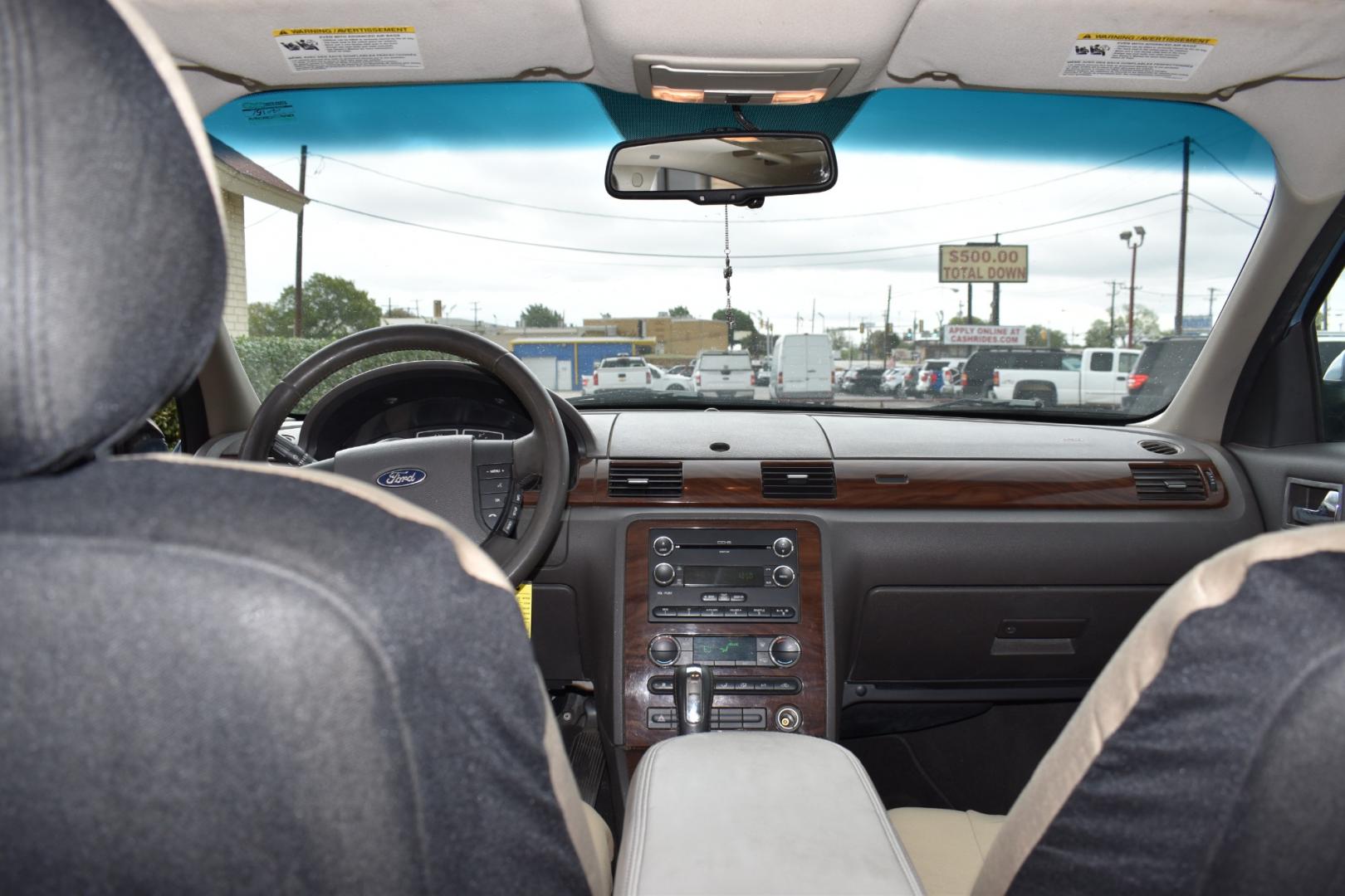 2008 Blue /Gray Ford Taurus SEL (1FAHP24W18G) with an 3.5L V6 DOHC 24V engine, 6-Speed Automatic Overdrive transmission, located at 5925 E. BELKNAP ST., HALTOM CITY, TX, 76117, (817) 834-4222, 32.803799, -97.259003 - Photo#28