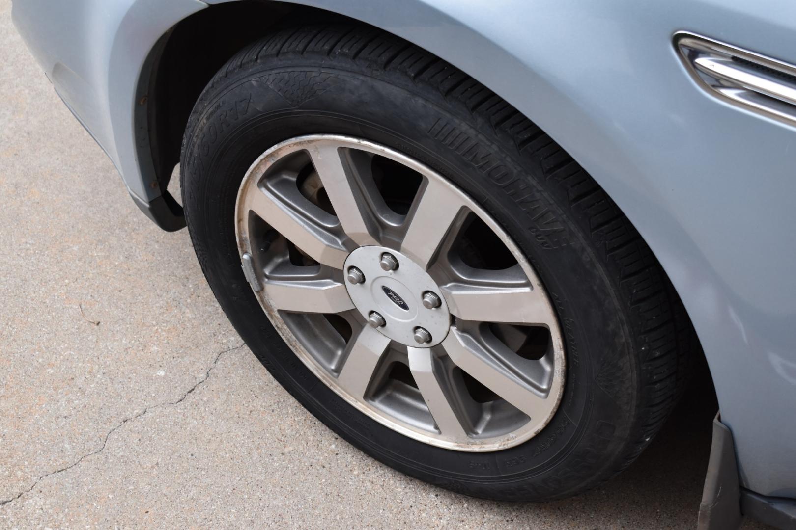 2008 Blue /Gray Ford Taurus SEL (1FAHP24W18G) with an 3.5L V6 DOHC 24V engine, 6-Speed Automatic Overdrive transmission, located at 5925 E. BELKNAP ST., HALTOM CITY, TX, 76117, (817) 834-4222, 32.803799, -97.259003 - Photo#31