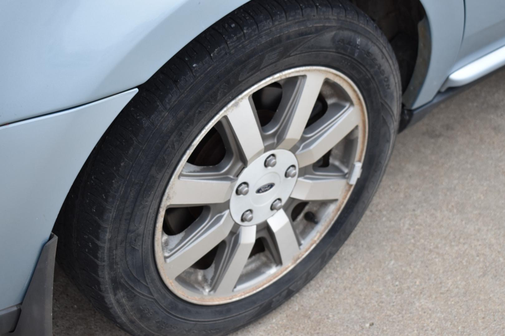 2008 Blue /Gray Ford Taurus SEL (1FAHP24W18G) with an 3.5L V6 DOHC 24V engine, 6-Speed Automatic Overdrive transmission, located at 5925 E. BELKNAP ST., HALTOM CITY, TX, 76117, (817) 834-4222, 32.803799, -97.259003 - Photo#33