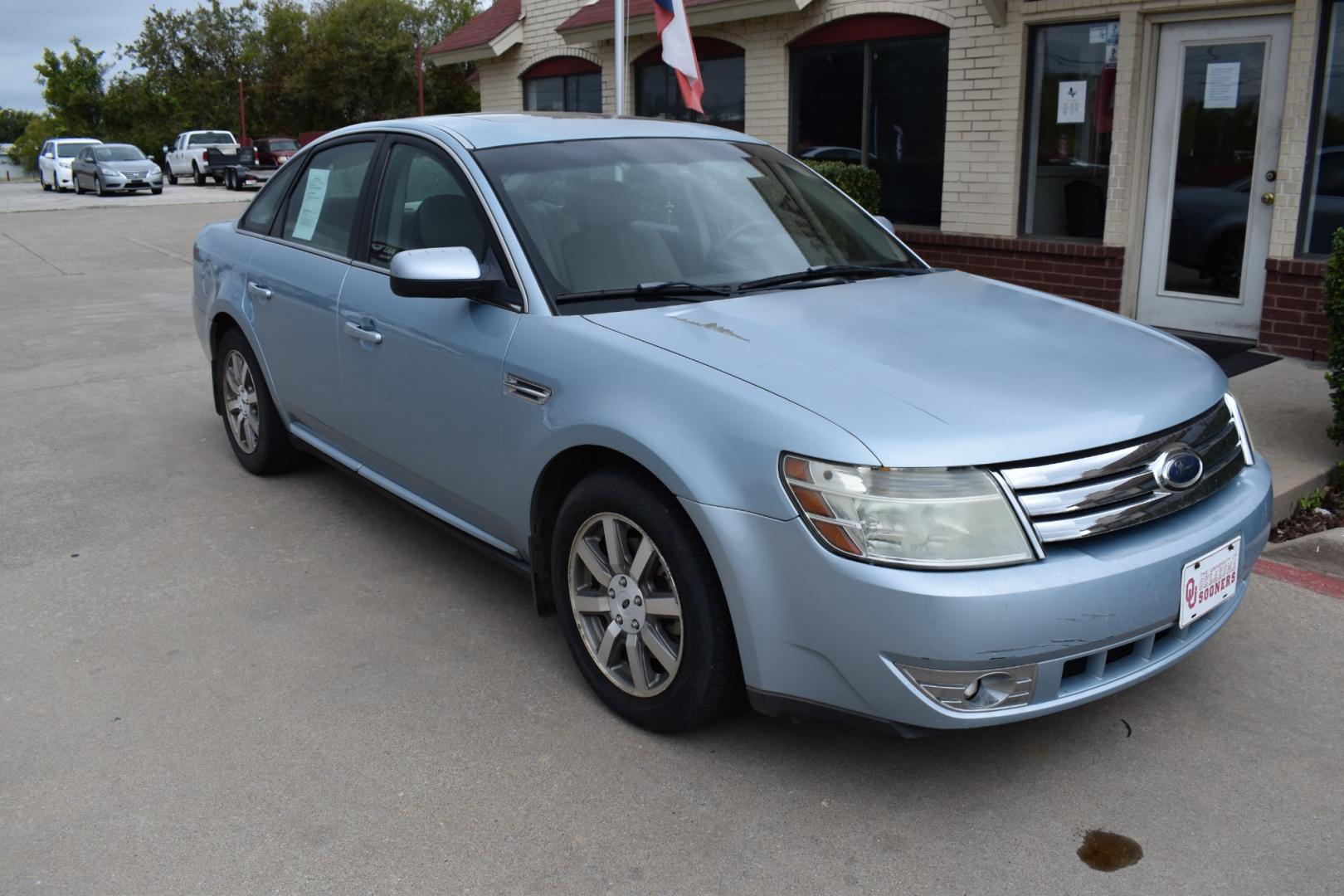 2008 Blue /Gray Ford Taurus SEL (1FAHP24W18G) with an 3.5L V6 DOHC 24V engine, 6-Speed Automatic Overdrive transmission, located at 5925 E. BELKNAP ST., HALTOM CITY, TX, 76117, (817) 834-4222, 32.803799, -97.259003 - Photo#5