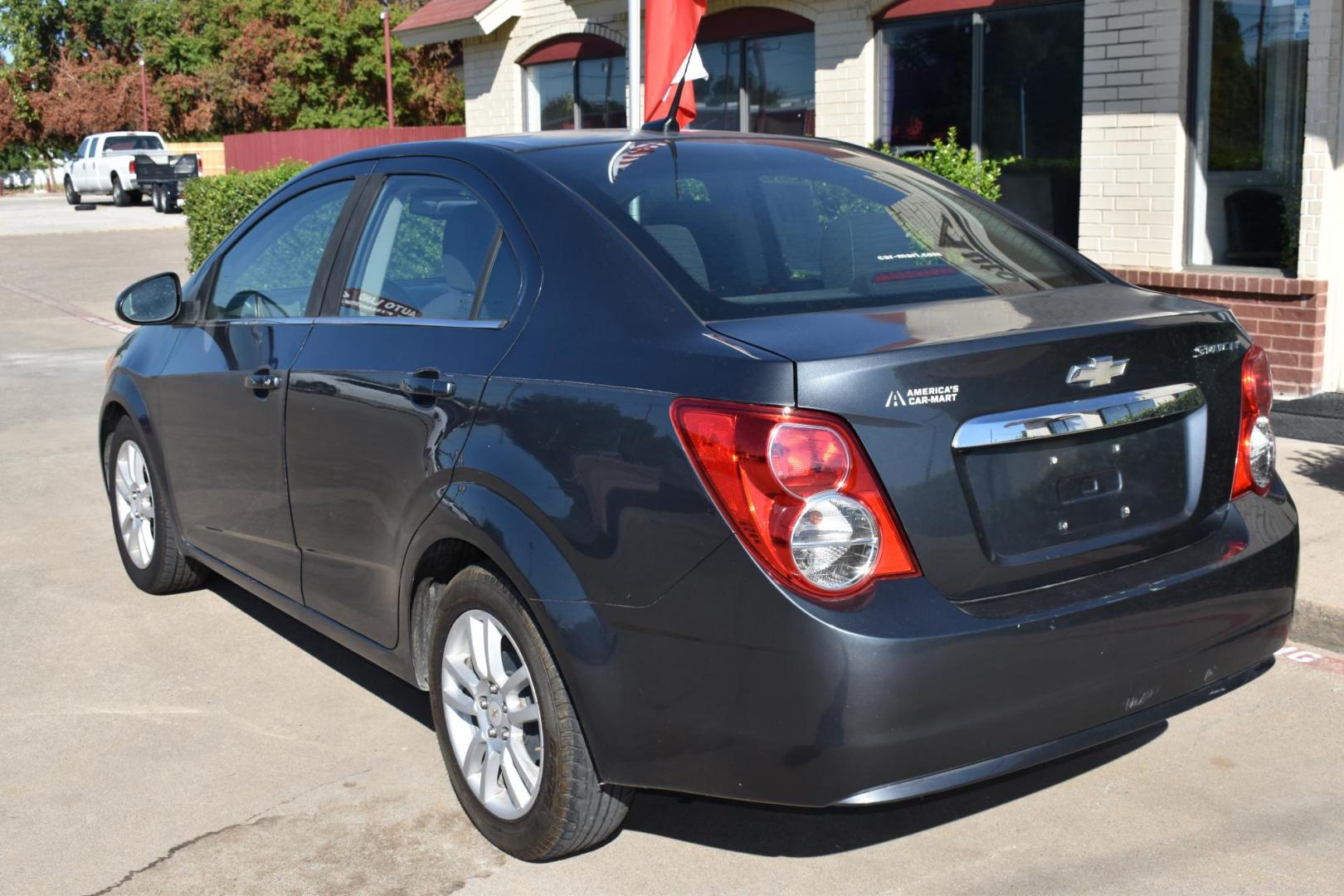 2012 Black /Gray Chevrolet Sonic (1G1JC5SH9C4) with an 4.1.8L engine, 6-Speed Automatic transmission, located at 5925 E. BELKNAP ST., HALTOM CITY, TX, 76117, (817) 834-4222, 32.803799, -97.259003 - Photo#1