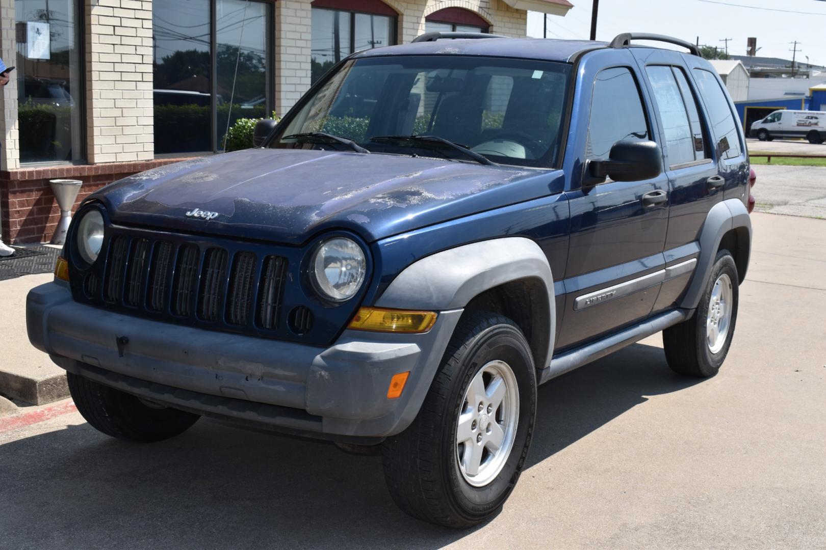 2005 Blue /Gray Jeep Liberty (1J4GK48K65W) with an 6 cylinder 3.71L engine, 4 SPEED AUTOMATIC transmission, located at 5925 E. BELKNAP ST., HALTOM CITY, TX, 76117, (817) 834-4222, 32.803799, -97.259003 - Buying a 2005 Jeep Liberty can offer several benefits: Off-road Capability: The Jeep Liberty is known for its ruggedness and off-road capability. It's equipped with features like four-wheel drive, solid axles, and ample ground clearance, making it suitable for tackling various terrains. Reliab - Photo#1