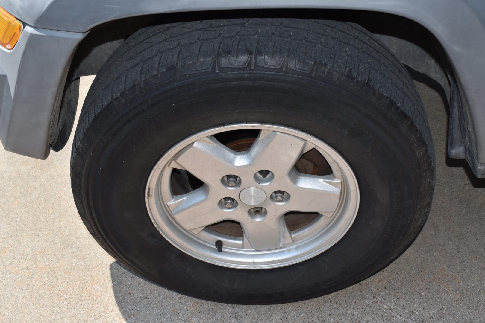 2005 Blue /Gray Jeep Liberty (1J4GK48K65W) with an 6 cylinder 3.71L engine, 4 SPEED AUTOMATIC transmission, located at 5925 E. BELKNAP ST., HALTOM CITY, TX, 76117, (817) 834-4222, 32.803799, -97.259003 - Buying a 2005 Jeep Liberty can offer several benefits: Off-road Capability: The Jeep Liberty is known for its ruggedness and off-road capability. It's equipped with features like four-wheel drive, solid axles, and ample ground clearance, making it suitable for tackling various terrains. Reliab - Photo#18