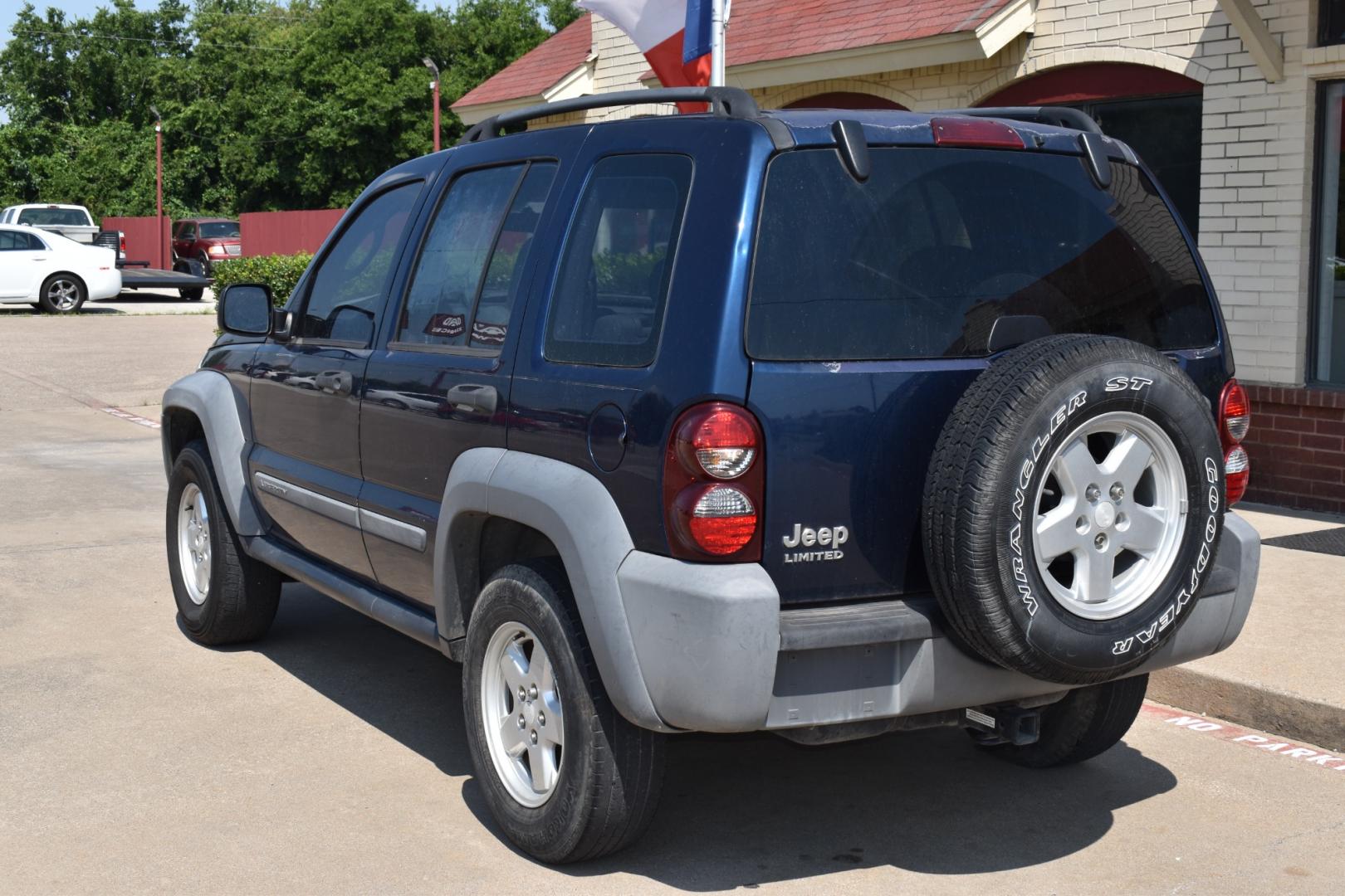 2005 Blue /Gray Jeep Liberty (1J4GK48K65W) with an 6 cylinder 3.71L engine, 4 SPEED AUTOMATIC transmission, located at 5925 E. BELKNAP ST., HALTOM CITY, TX, 76117, (817) 834-4222, 32.803799, -97.259003 - Buying a 2005 Jeep Liberty can offer several benefits: Off-road Capability: The Jeep Liberty is known for its ruggedness and off-road capability. It's equipped with features like four-wheel drive, solid axles, and ample ground clearance, making it suitable for tackling various terrains. Reliab - Photo#2