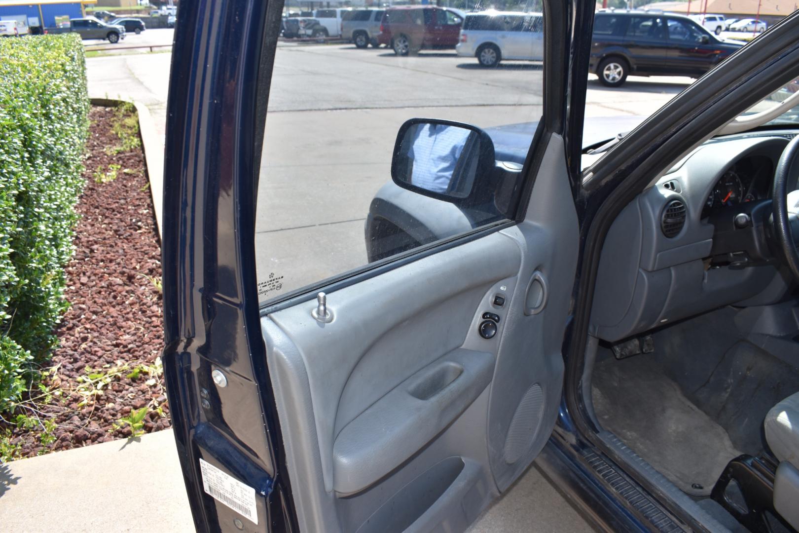 2005 Blue /Gray Jeep Liberty (1J4GK48K65W) with an 6 cylinder 3.71L engine, 4 SPEED AUTOMATIC transmission, located at 5925 E. BELKNAP ST., HALTOM CITY, TX, 76117, (817) 834-4222, 32.803799, -97.259003 - Buying a 2005 Jeep Liberty can offer several benefits: Off-road Capability: The Jeep Liberty is known for its ruggedness and off-road capability. It's equipped with features like four-wheel drive, solid axles, and ample ground clearance, making it suitable for tackling various terrains. Reliab - Photo#6