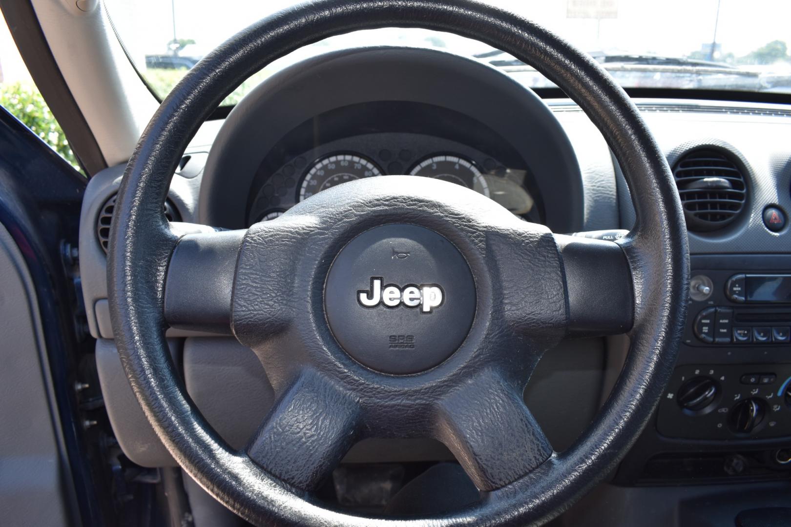 2005 Blue /Gray Jeep Liberty (1J4GK48K65W) with an 6 cylinder 3.71L engine, 4 SPEED AUTOMATIC transmission, located at 5925 E. BELKNAP ST., HALTOM CITY, TX, 76117, (817) 834-4222, 32.803799, -97.259003 - Buying a 2005 Jeep Liberty can offer several benefits: Off-road Capability: The Jeep Liberty is known for its ruggedness and off-road capability. It's equipped with features like four-wheel drive, solid axles, and ample ground clearance, making it suitable for tackling various terrains. Reliab - Photo#8