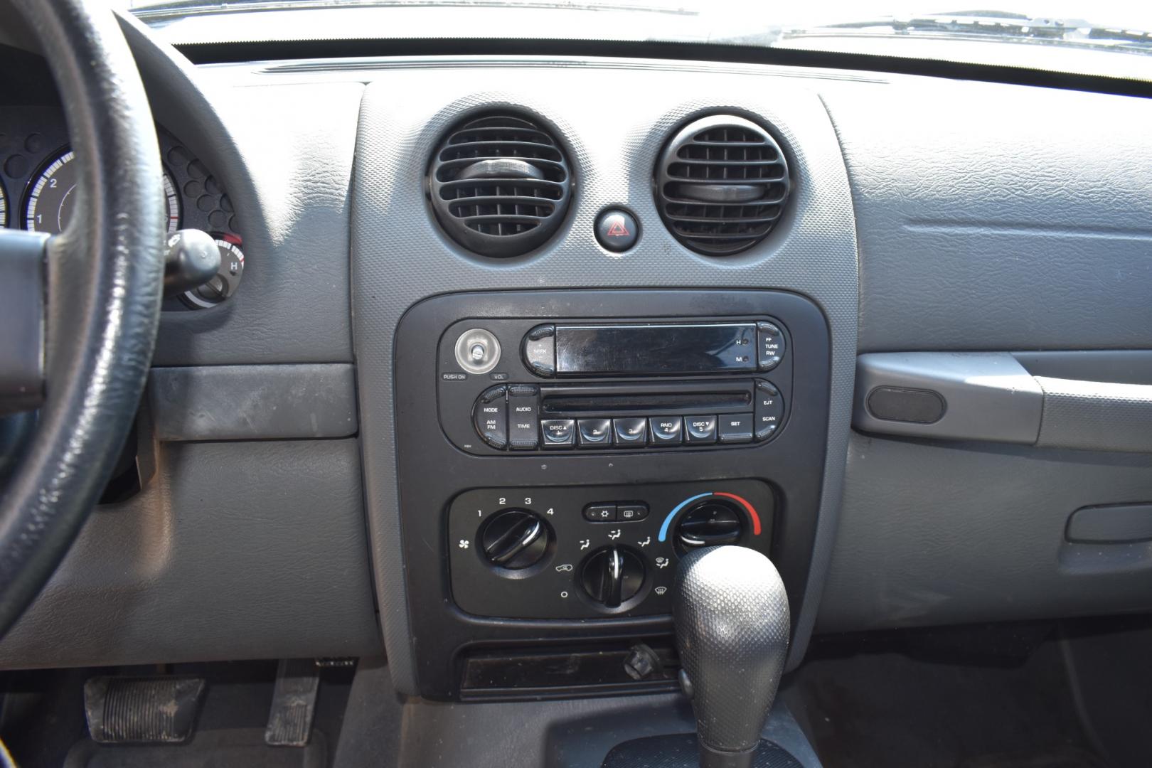 2005 Blue /Gray Jeep Liberty (1J4GK48K65W) with an 6 cylinder 3.71L engine, 4 SPEED AUTOMATIC transmission, located at 5925 E. BELKNAP ST., HALTOM CITY, TX, 76117, (817) 834-4222, 32.803799, -97.259003 - Buying a 2005 Jeep Liberty can offer several benefits: Off-road Capability: The Jeep Liberty is known for its ruggedness and off-road capability. It's equipped with features like four-wheel drive, solid axles, and ample ground clearance, making it suitable for tackling various terrains. Reliab - Photo#9