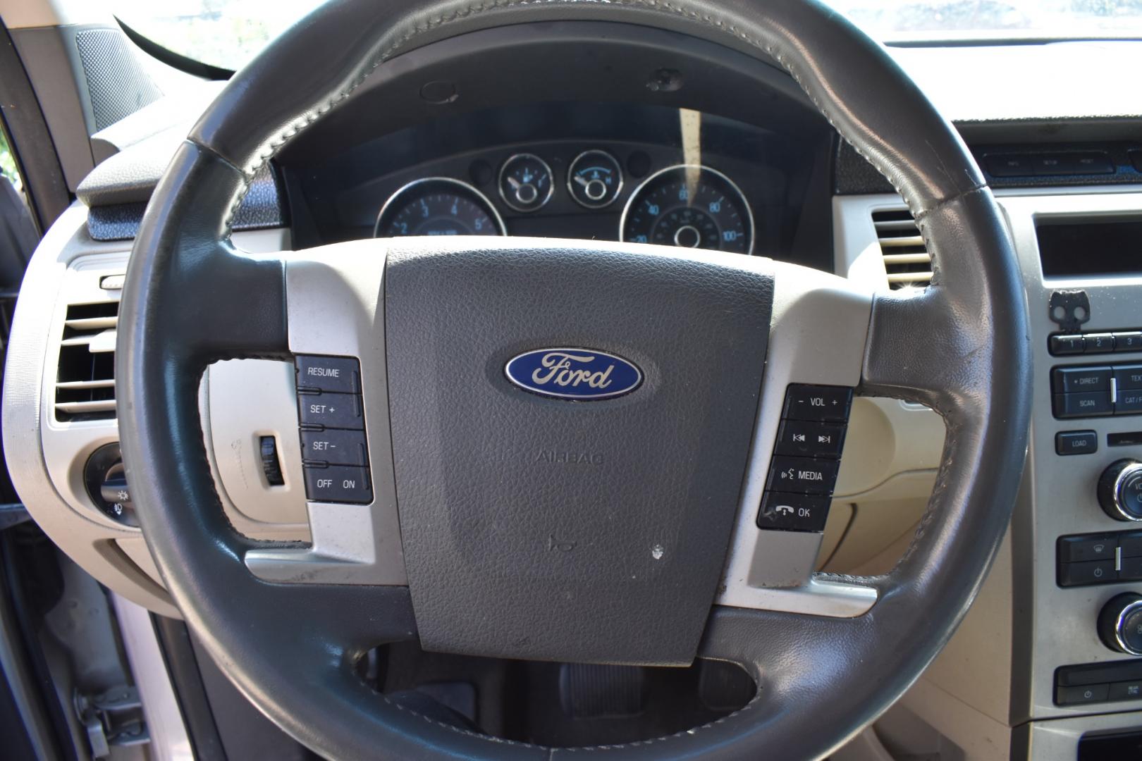 2011 Silver /Gray Ford Flex (2FMGK5BC5BB) with an 3.5L V6 engine, 6-Speed Automatic transmission, located at 5925 E. BELKNAP ST., HALTOM CITY, TX, 76117, (817) 834-4222, 32.803799, -97.259003 - Buying a 2011 Ford Flex can offer several benefits: Spacious Interior: The Ford Flex is known for its roomy interior, with three rows of seating that can accommodate up to seven passengers comfortably. This makes it a great choice for families or anyone who needs ample space for passengers and ca - Photo#8