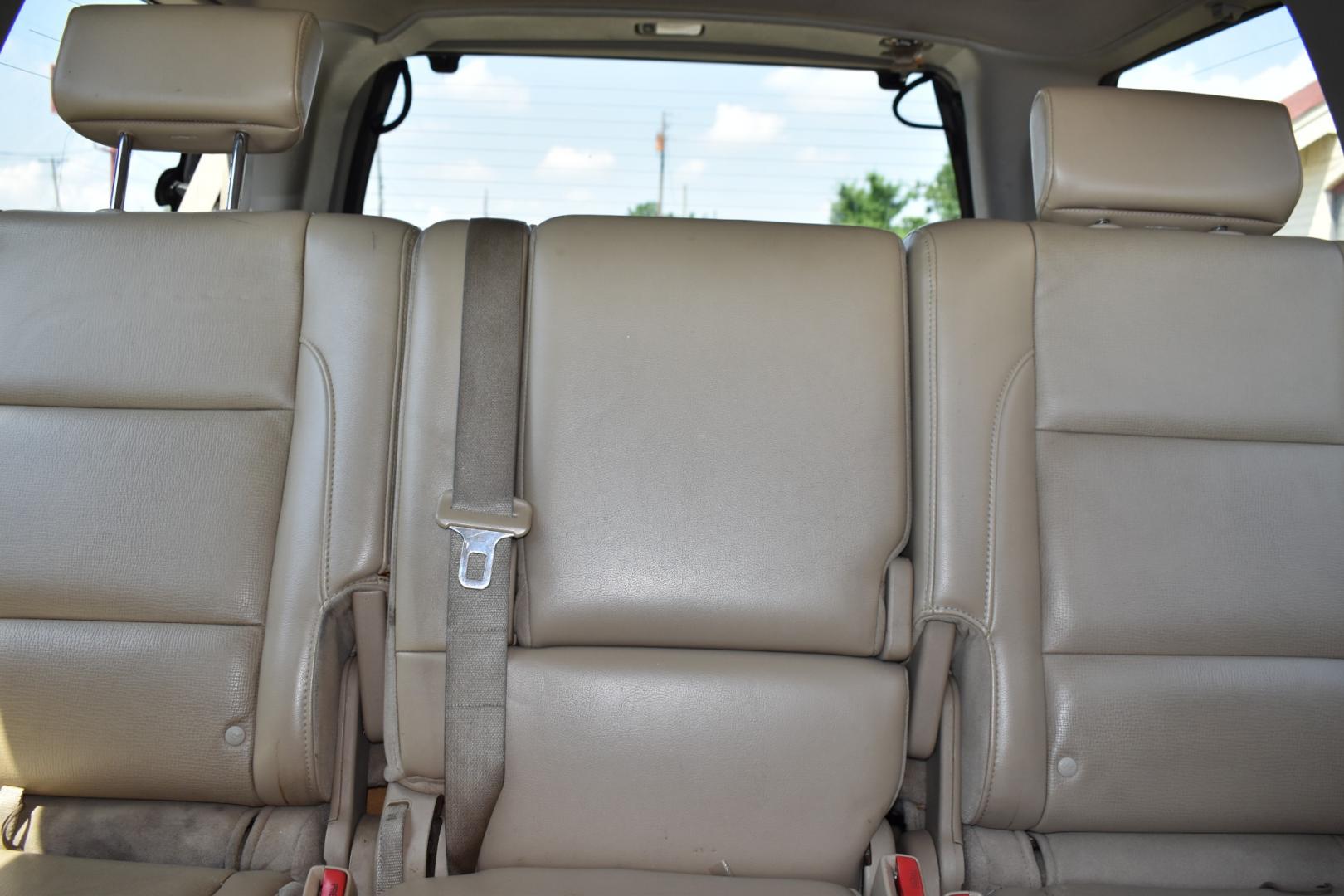 2009 Red /Tan Nissan Armada (5N1AA08C49N) with an V8 5.6 L engine, 5 SPEED AUTOMATIC transmission, located at 5925 E. BELKNAP ST., HALTOM CITY, TX, 76117, (817) 834-4222, 32.803799, -97.259003 - Buying a 2009 Nissan Armada offers several benefits: Powerful V8 Engine: The 2009 Nissan Armada is equipped with a robust 5.6-liter V8 engine, providing ample power for towing and hauling heavy loads. This engine delivers strong acceleration and performance, making it suitable for both daily driv - Photo#16