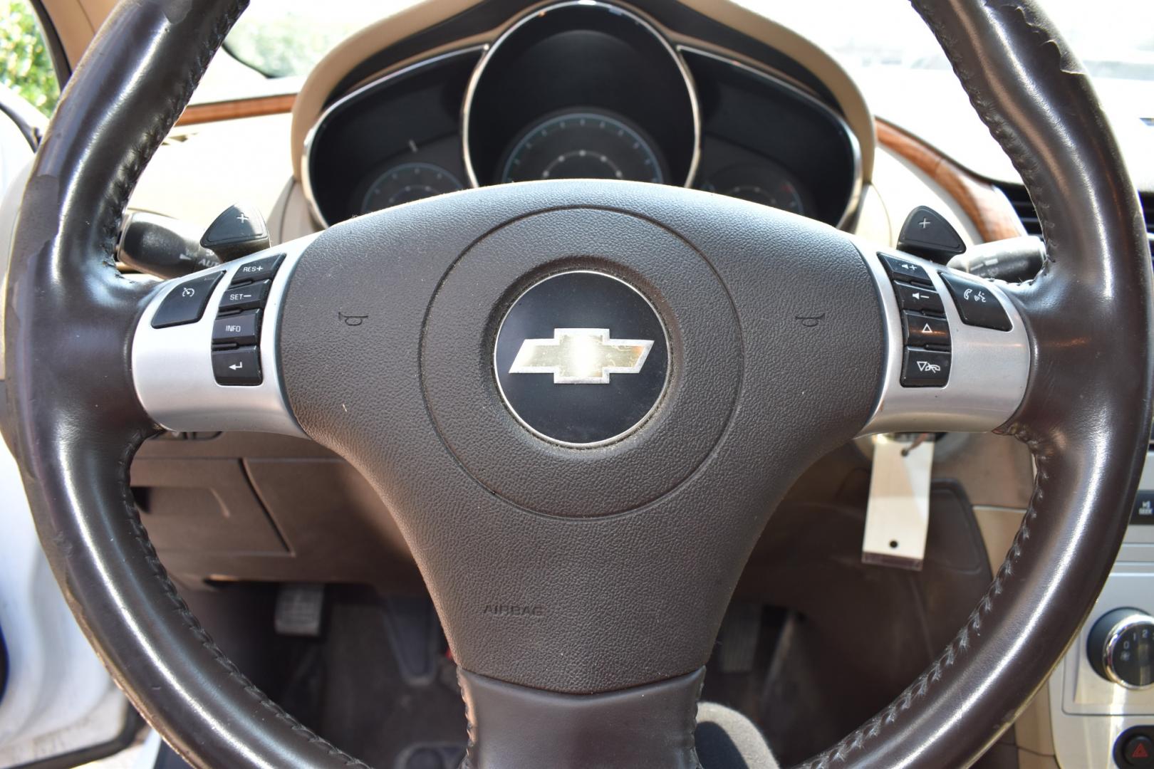 2009 White /Tan Chevrolet Malibu (1G1ZJ57B19F) with an 4 2.4L engine, 6-Speed Automatic transmission, located at 5925 E. BELKNAP ST., HALTOM CITY, TX, 76117, (817) 834-4222, 32.803799, -97.259003 - Buying a 2009 Chevrolet Malibu offers several benefits: Fuel Efficiency: The 2009 Malibu typically offers good fuel efficiency, especially with its four-cylinder engine options. This makes it an economical choice for daily commuting and long-distance driving. Comfortable Ride: The Malibu is kn - Photo#8