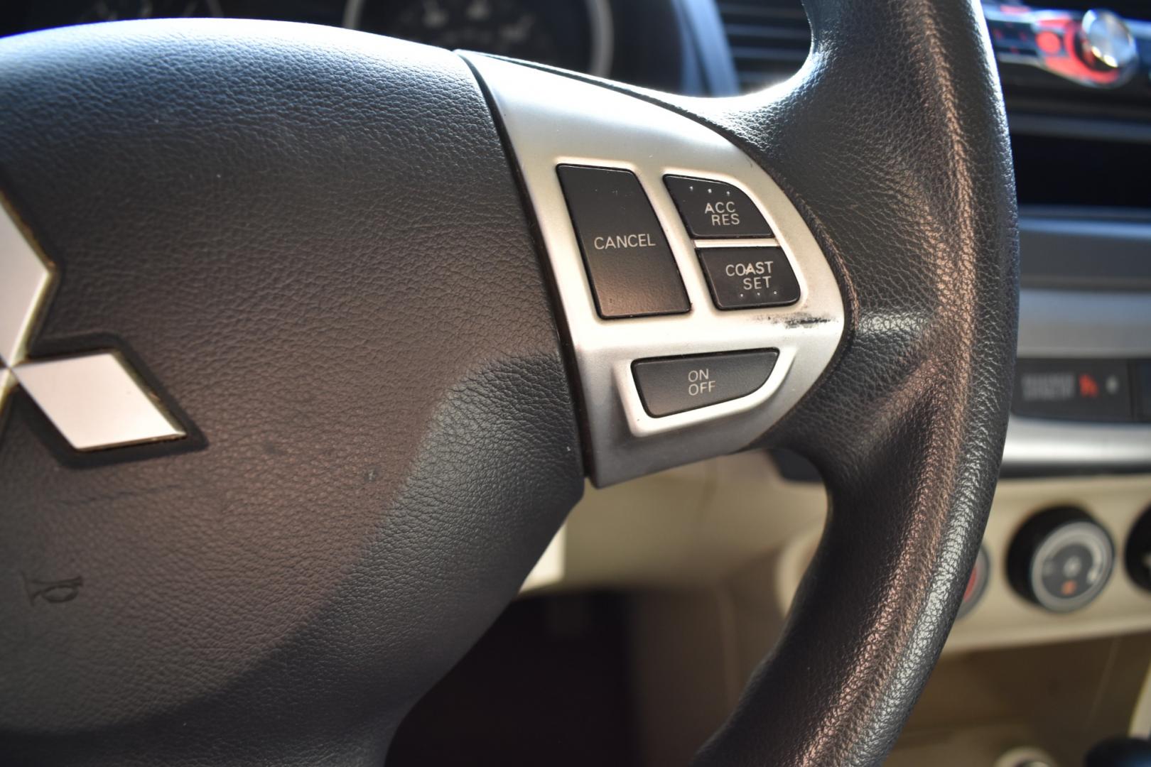 2011 White /Beige Mitsubishi Lancer (JA32U2FU8BU) with an 4 cylinder 2.0L engine, Automatic transmission, located at 5925 E. BELKNAP ST., HALTOM CITY, TX, 76117, (817) 834-4222, 32.803799, -97.259003 - Buying a 2011 Mitsubishi Lancer can have several benefits, depending on your needs and preferences: Affordability: Older model years like the 2011 Lancer tend to be more affordable compared to newer cars of the same model. This can save you money on the purchase price. Proven Design: By 2011, the - Photo#11