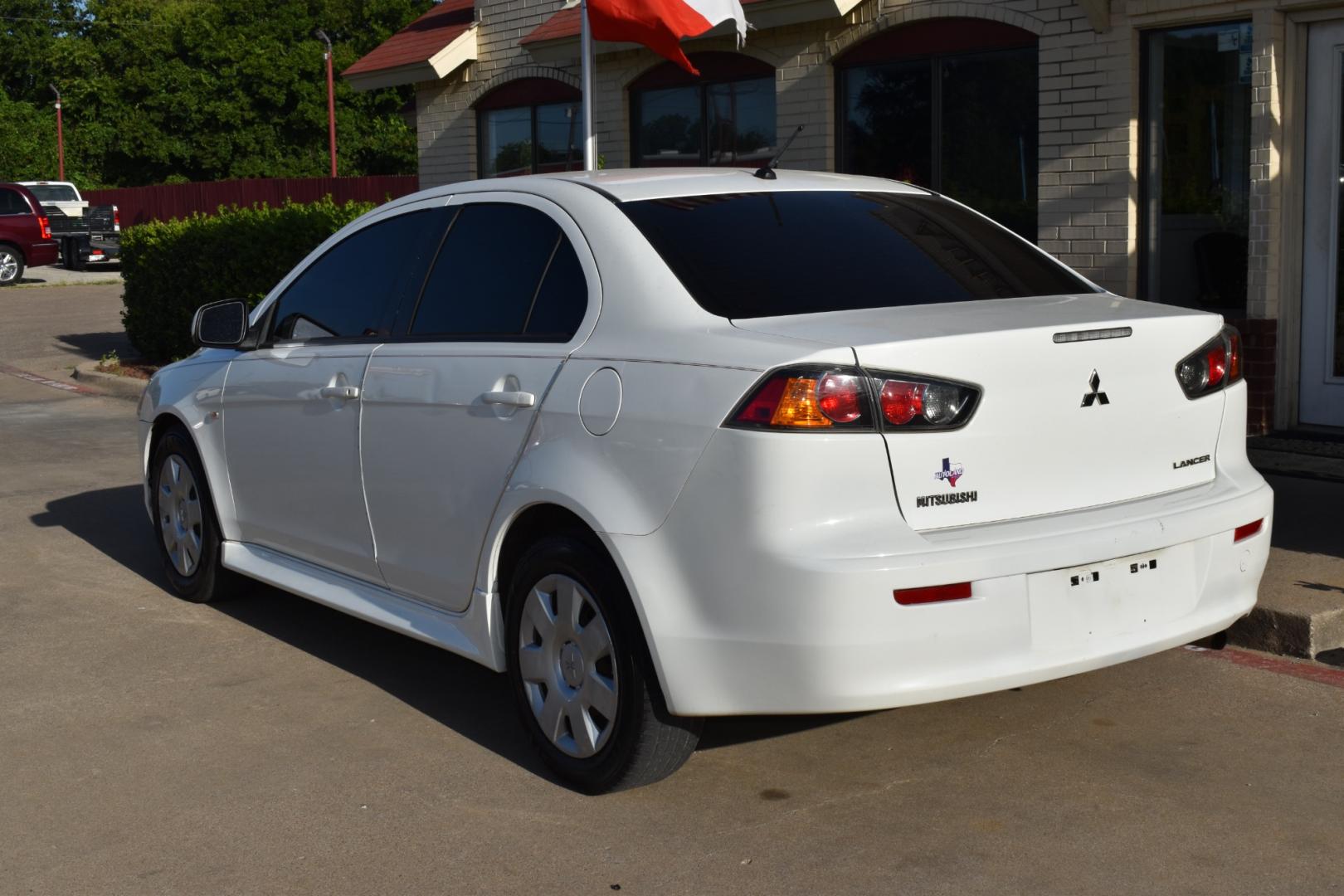 2011 White /Beige Mitsubishi Lancer (JA32U2FU8BU) with an 4 cylinder 2.0L engine, Automatic transmission, located at 5925 E. BELKNAP ST., HALTOM CITY, TX, 76117, (817) 834-4222, 32.803799, -97.259003 - Buying a 2011 Mitsubishi Lancer can have several benefits, depending on your needs and preferences: Affordability: Older model years like the 2011 Lancer tend to be more affordable compared to newer cars of the same model. This can save you money on the purchase price. Proven Design: By 2011, the - Photo#2