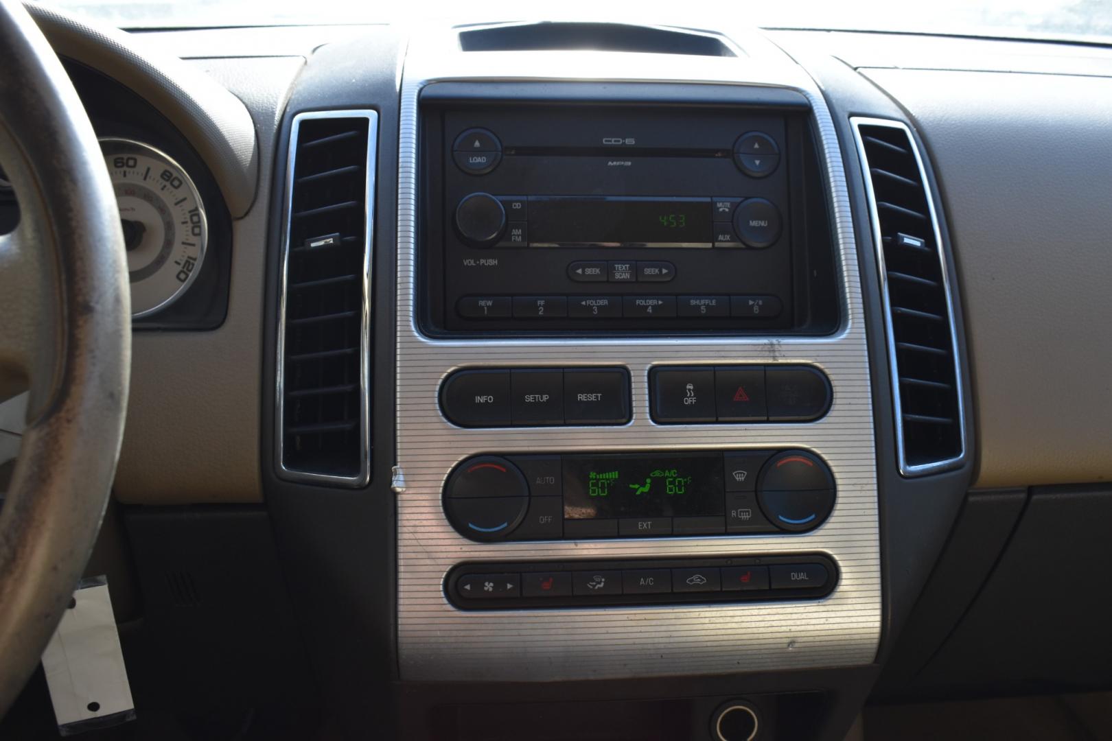 2007 White /Tan Ford Edge SEL Plus FWD (2FMDK39C27B) with an 3.5L V6 DOHC 24V engine, 6-Speed Automatic Overdrive transmission, located at 5925 E. BELKNAP ST., HALTOM CITY, TX, 76117, (817) 834-4222, 32.803799, -97.259003 - Buying a 2007 Ford Edge can offer several benefits, particularly if you're looking for a midsize crossover SUV from that era: Spacious Interior: The Ford Edge is known for its roomy interior, providing ample space for passengers and cargo. This makes it a practical choice for families or those who - Photo#14