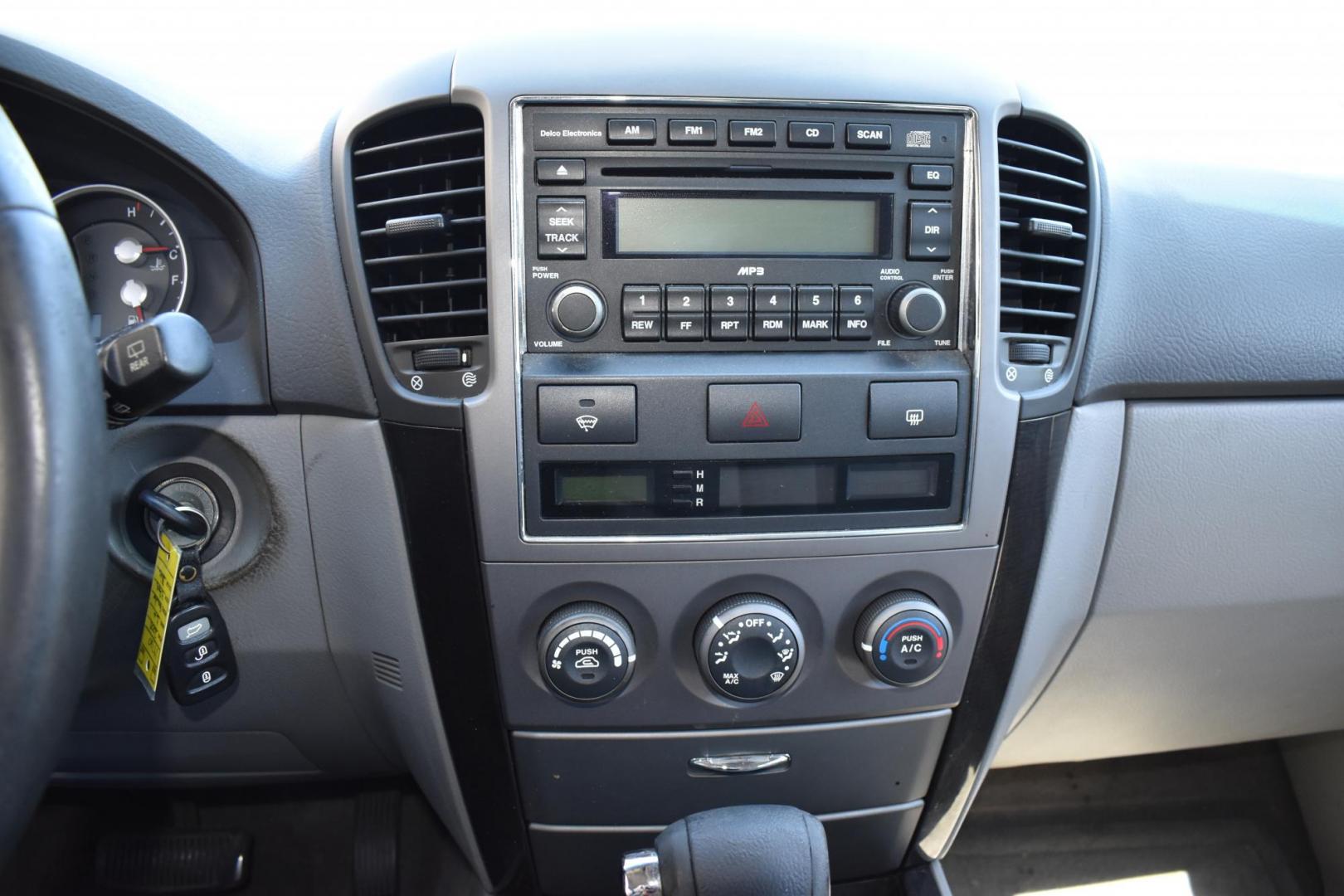 2008 Blue /Gray Kia Sorento Base (KNDJD736985) with an 3.8L V6 DOHC 24V engine, 5-Speed Automatic Overdrive transmission, located at 5925 E. BELKNAP ST., HALTOM CITY, TX, 76117, (817) 834-4222, 32.803799, -97.259003 - Photo#19