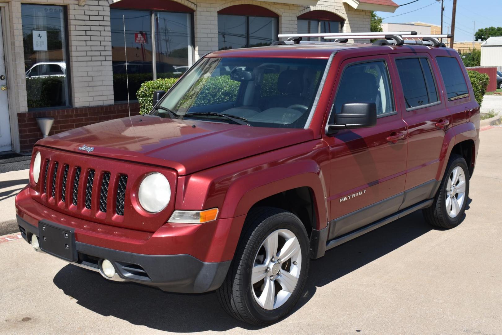 2012 Maroon /Black Jeep Patriot Limited 4WD (1C4NJRCB1CD) with an 2.4L L4 DOHC 16V engine, 4 SPEED AUTOMATIC 4X4 transmission, located at 5925 E. BELKNAP ST., HALTOM CITY, TX, 76117, (817) 834-4222, 32.803799, -97.259003 - Buying a 2012 Jeep Patriot can be a great choice if you're looking for a compact SUV with distinctive features and a rugged character. Here are some of the benefits of considering a 2012 Jeep Patriot: Off-Road Capability: The 2012 Jeep Patriot offers notable off-road capability, especially if you - Photo#1