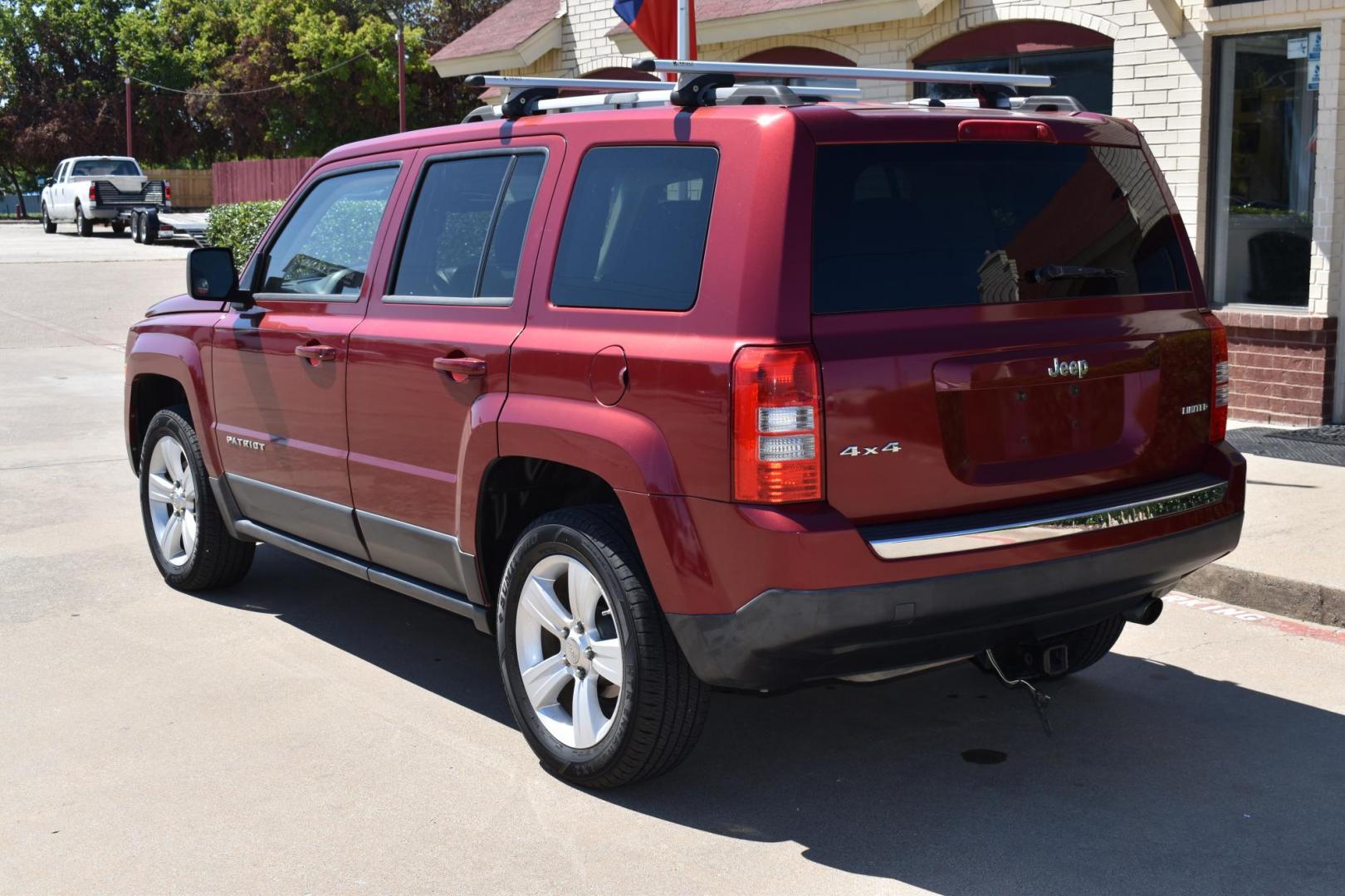 2012 Maroon /Black Jeep Patriot Limited 4WD (1C4NJRCB1CD) with an 2.4L L4 DOHC 16V engine, 4 SPEED AUTOMATIC 4X4 transmission, located at 5925 E. BELKNAP ST., HALTOM CITY, TX, 76117, (817) 834-4222, 32.803799, -97.259003 - Buying a 2012 Jeep Patriot can be a great choice if you're looking for a compact SUV with distinctive features and a rugged character. Here are some of the benefits of considering a 2012 Jeep Patriot: Off-Road Capability: The 2012 Jeep Patriot offers notable off-road capability, especially if you - Photo#2