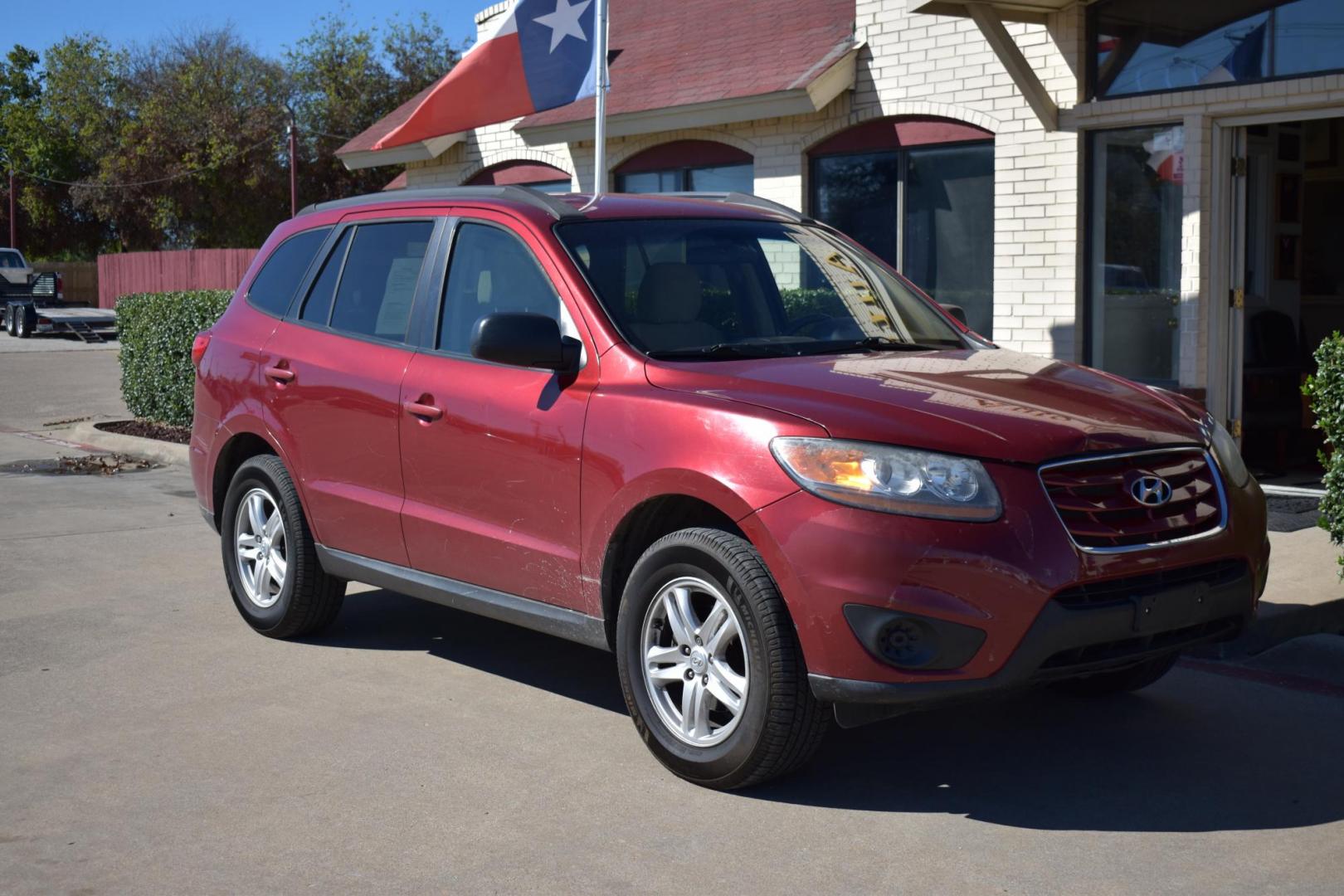 2011 Red /Gray Hyundai Santa Fe GLS 3.5 FWD (5XYZG4AG8BG) with an 3.5L V6 DOHC 24V engine, 6-Speed Automatic transmission, located at 5925 E. BELKNAP ST., HALTOM CITY, TX, 76117, (817) 834-4222, 32.803799, -97.259003 - The 2011 Hyundai Santa Fe GLS could be a solid option depending on your needs and preferences. Here's why you might consider buying it: 1. Affordability and Value Lower price: Being a 2011 model, you can often find it at a relatively low price compared to newer vehicles. This could offer great v - Photo#5