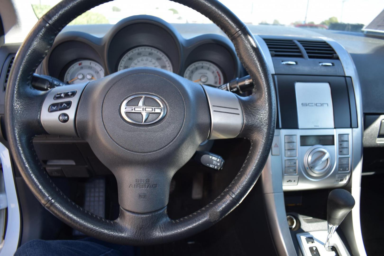 2008 White /Black Scion tC Sport Coupe (JTKDE167280) with an 2.4L L4 DOHC 16V engine, 4 SPEED AUTOMATIC transmission, located at 5925 E. BELKNAP ST., HALTOM CITY, TX, 76117, (817) 834-4222, 32.803799, -97.259003 - The 2008 Scion TC Sport Coupe could be an appealing choice if you’re looking for a budget-friendly, sporty, and customizable compact car with a reputation for reliability and fun-to-drive dynamics. Here’s why you might consider buying a 2008 Scion TC: 1. Sporty Design and Fun-to-Drive Attrac - Photo#10