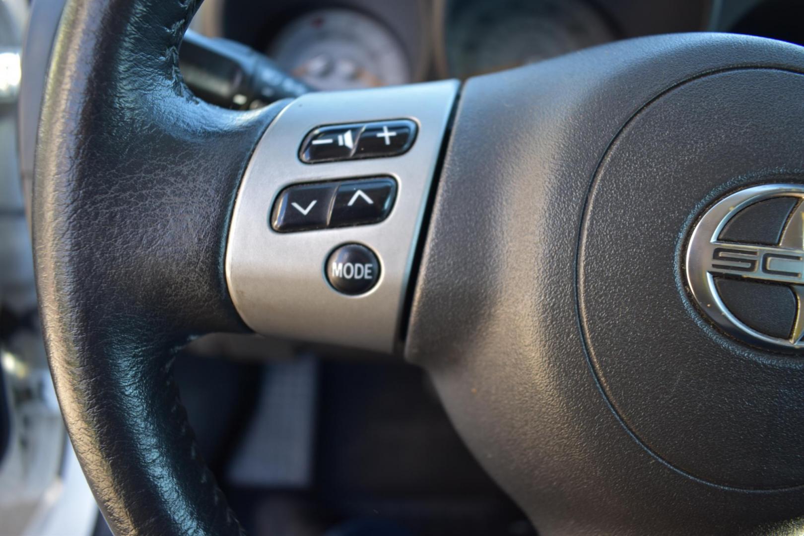 2008 White /Black Scion tC Sport Coupe (JTKDE167280) with an 2.4L L4 DOHC 16V engine, 4 SPEED AUTOMATIC transmission, located at 5925 E. BELKNAP ST., HALTOM CITY, TX, 76117, (817) 834-4222, 32.803799, -97.259003 - The 2008 Scion TC Sport Coupe could be an appealing choice if you’re looking for a budget-friendly, sporty, and customizable compact car with a reputation for reliability and fun-to-drive dynamics. Here’s why you might consider buying a 2008 Scion TC: 1. Sporty Design and Fun-to-Drive Attrac - Photo#11