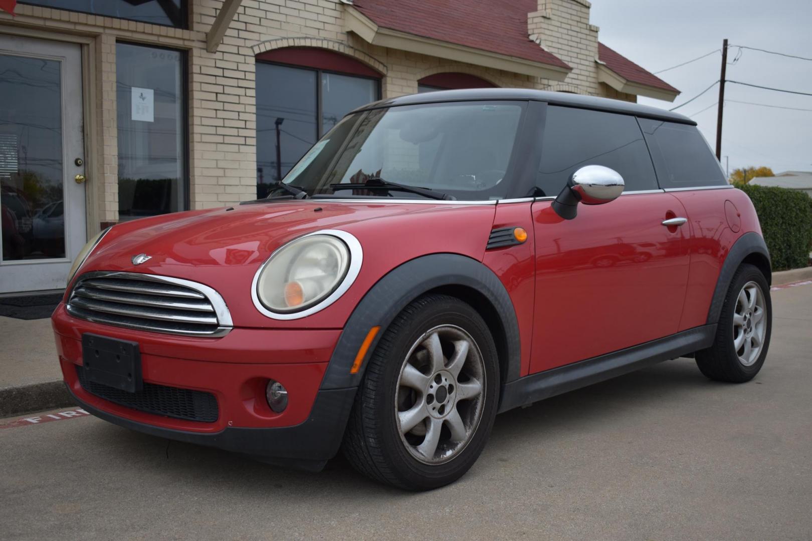 2010 Red /Black Mini Cooper Base (WMWMF3C58AT) with an 1.6L L4 DOHC 16V engine, 6 Speed AUTOMATIC transmission, located at 5925 E. BELKNAP ST., HALTOM CITY, TX, 76117, (817) 834-4222, 32.803799, -97.259003 - The 2010 Mini Cooper Base can be a great option if you're looking for a fun, stylish, and compact car. Here are some key reasons why you might consider purchasing a 2010 Mini Cooper Base: 1. Fun to Drive The Mini Cooper Base is renowned for its engaging driving experience. Its small size, nimble - Photo#1