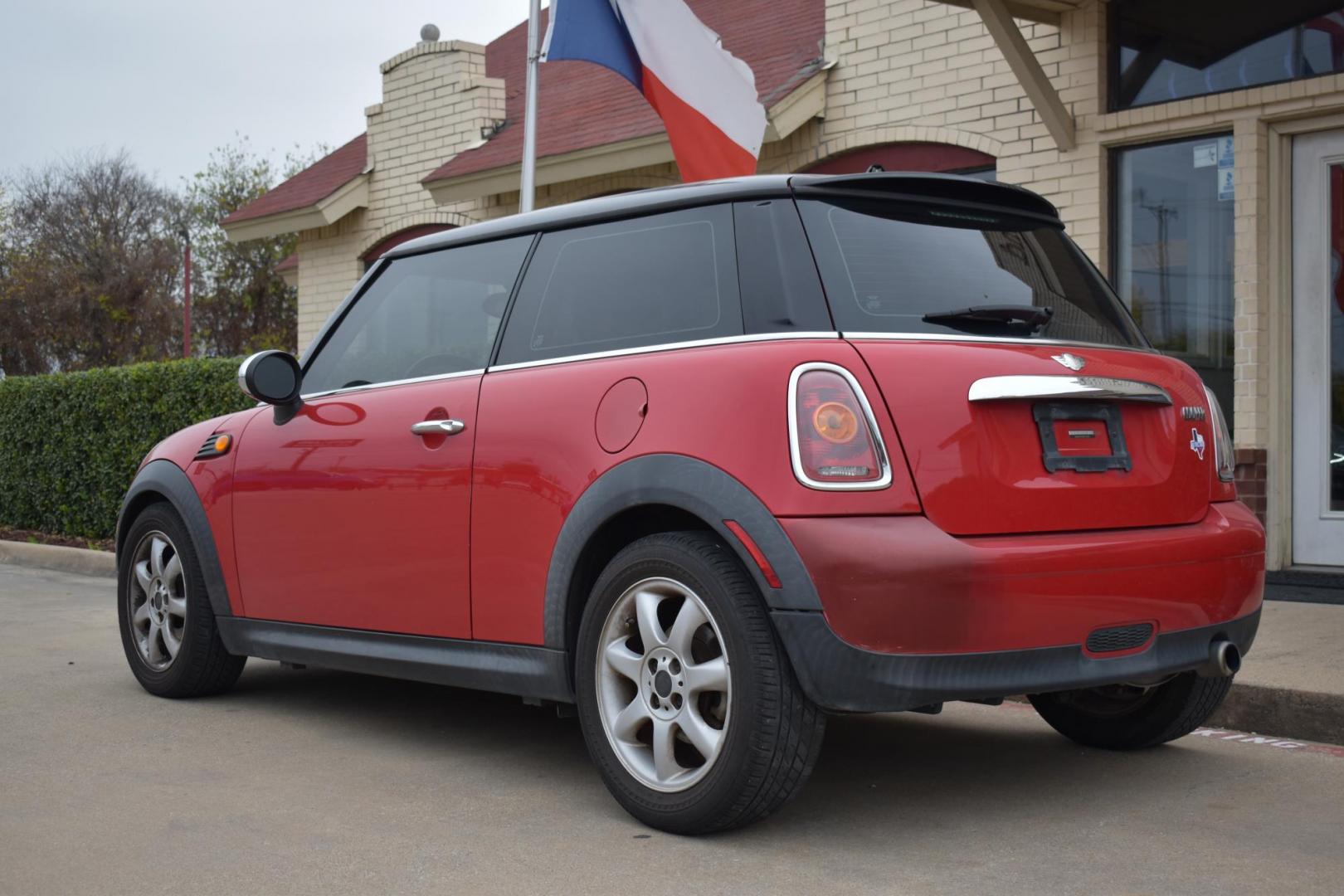 2010 Red /Black Mini Cooper Base (WMWMF3C58AT) with an 1.6L L4 DOHC 16V engine, 6 Speed AUTOMATIC transmission, located at 5925 E. BELKNAP ST., HALTOM CITY, TX, 76117, (817) 834-4222, 32.803799, -97.259003 - The 2010 Mini Cooper Base can be a great option if you're looking for a fun, stylish, and compact car. Here are some key reasons why you might consider purchasing a 2010 Mini Cooper Base: 1. Fun to Drive The Mini Cooper Base is renowned for its engaging driving experience. Its small size, nimble - Photo#2