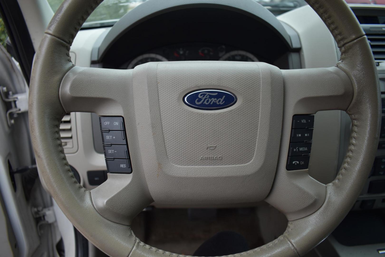 2011 White /Tan Ford Escape XLT FWD (1FMCU0D77BK) with an 2.5L L4 DOHC 16V engine, 6-Speed Automatic transmission, located at 5925 E. BELKNAP ST., HALTOM CITY, TX, 76117, (817) 834-4222, 32.803799, -97.259003 - The 2011 Ford Escape XLT FWD is a compact SUV that offers a solid mix of reliability, practicality, and versatility. Here are several reasons why you might consider buying this vehicle: 1. Strong Performance and Handling The 2011 Ford Escape XLT FWD comes with a 2.5-liter 4-cylinder engine that - Photo#10