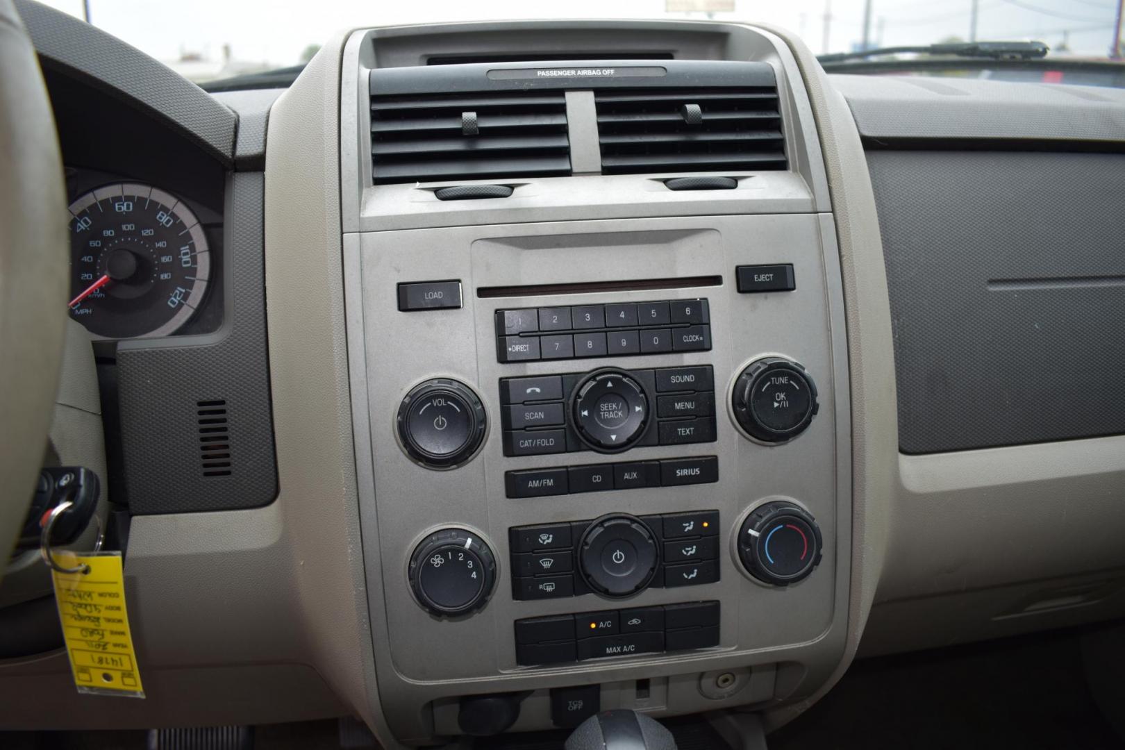 2011 White /Tan Ford Escape XLT FWD (1FMCU0D77BK) with an 2.5L L4 DOHC 16V engine, 6-Speed Automatic transmission, located at 5925 E. BELKNAP ST., HALTOM CITY, TX, 76117, (817) 834-4222, 32.803799, -97.259003 - The 2011 Ford Escape XLT FWD is a compact SUV that offers a solid mix of reliability, practicality, and versatility. Here are several reasons why you might consider buying this vehicle: 1. Strong Performance and Handling The 2011 Ford Escape XLT FWD comes with a 2.5-liter 4-cylinder engine that - Photo#14