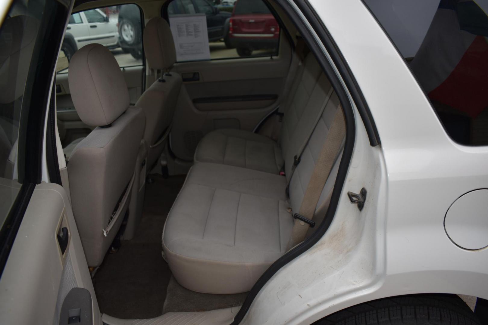 2011 White /Tan Ford Escape XLT FWD (1FMCU0D77BK) with an 2.5L L4 DOHC 16V engine, 6-Speed Automatic transmission, located at 5925 E. BELKNAP ST., HALTOM CITY, TX, 76117, (817) 834-4222, 32.803799, -97.259003 - The 2011 Ford Escape XLT FWD is a compact SUV that offers a solid mix of reliability, practicality, and versatility. Here are several reasons why you might consider buying this vehicle: 1. Strong Performance and Handling The 2011 Ford Escape XLT FWD comes with a 2.5-liter 4-cylinder engine that - Photo#23