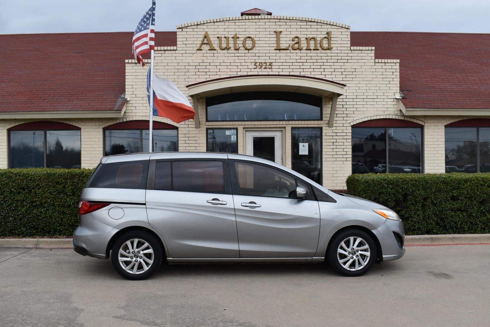 2013 Gray /Black Mazda MAZDA5 Sport AT (JM1CW2BL1D0) with an 2.5L L4 DOHC 16V engine, 5-Speed Automatic transmission, located at 5925 E. BELKNAP ST., HALTOM CITY, TX, 76117, (817) 834-4222, 32.803799, -97.259003 - Ah, the 2013 Mazda5! Here are some of its benefits: Versatility: The Mazda5 offers the practicality of a minivan with the maneuverability of a smaller car. Its sliding rear doors make it easy to access tight parking spaces and to get kids in and out. Seating: With seating for six, it has enoug - Photo#3