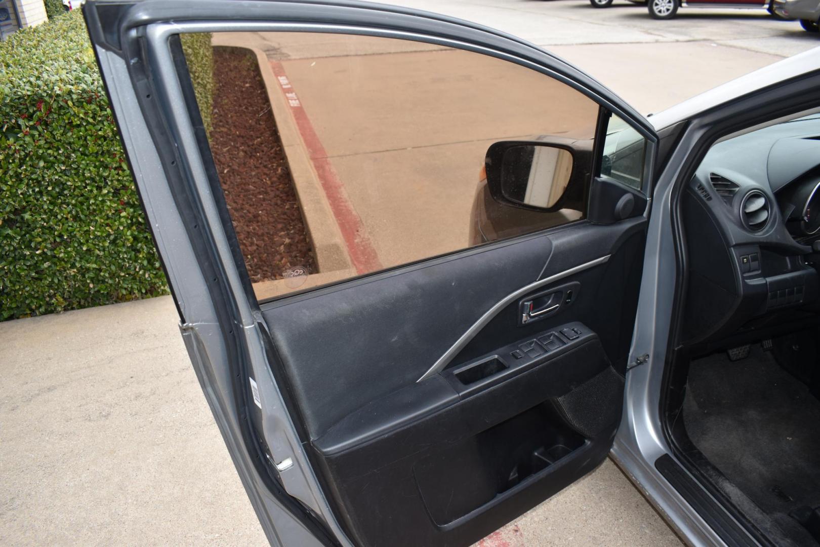 2013 Gray /Black Mazda MAZDA5 Sport AT (JM1CW2BL1D0) with an 2.5L L4 DOHC 16V engine, 5-Speed Automatic transmission, located at 5925 E. BELKNAP ST., HALTOM CITY, TX, 76117, (817) 834-4222, 32.803799, -97.259003 - Ah, the 2013 Mazda5! Here are some of its benefits: Versatility: The Mazda5 offers the practicality of a minivan with the maneuverability of a smaller car. Its sliding rear doors make it easy to access tight parking spaces and to get kids in and out. Seating: With seating for six, it has enoug - Photo#6